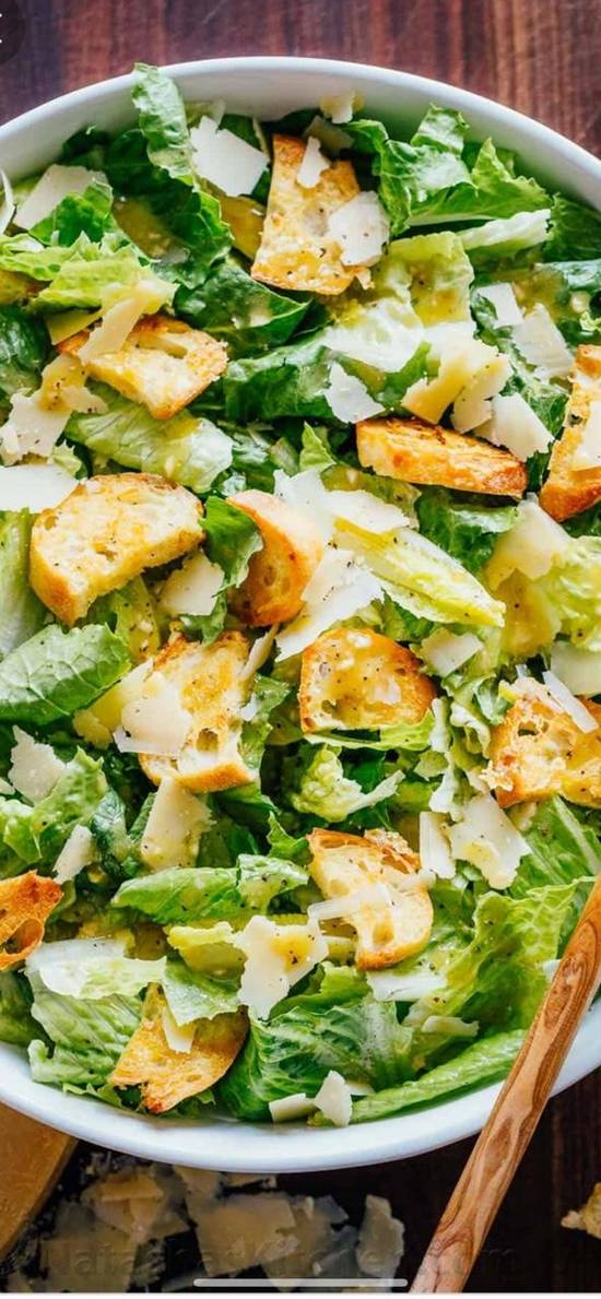 Order Caesar Salad food online from Fat Tomato Pizza store, Los Angeles on bringmethat.com