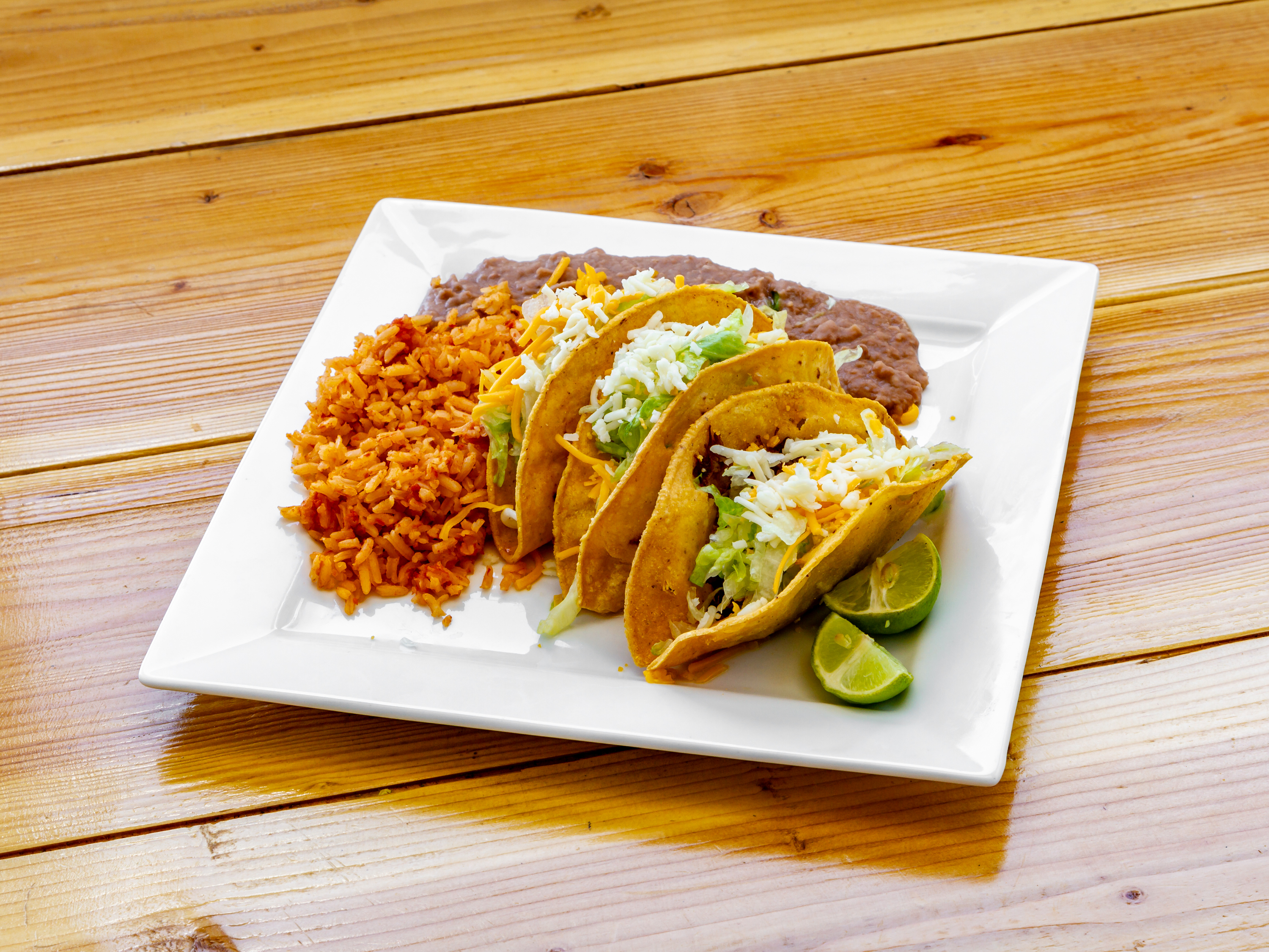 Order 1. Three Tacos Combo food online from Viva Burrito store, Tucson on bringmethat.com