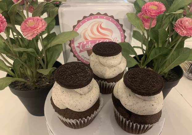 Order Cookies & Cream Cupcake food online from Caked Up Cafe store, New City on bringmethat.com
