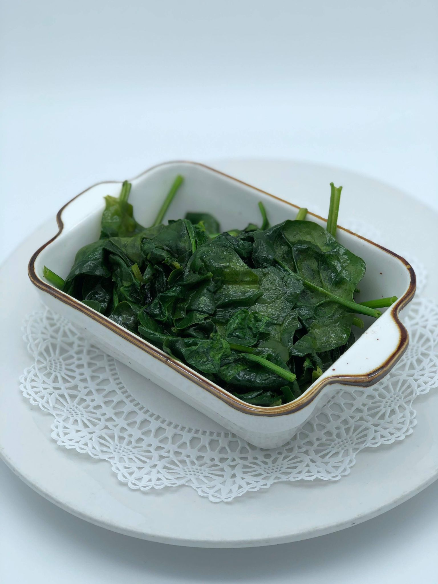 Order Sauteed Spinach food online from Petit Robert Bistro store, Boston on bringmethat.com