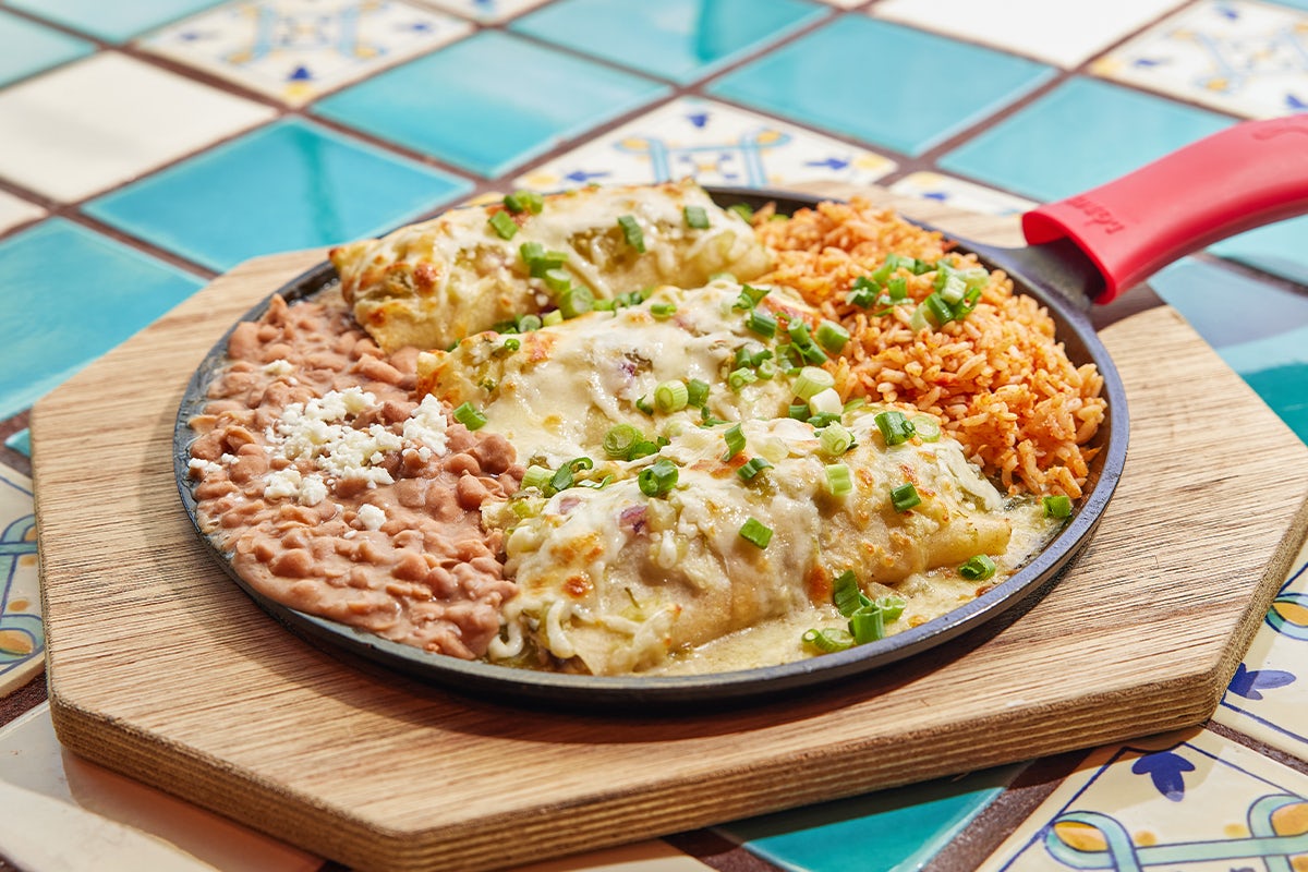 Order Skillet Baked Enchiladas food online from Margaritas Mexican Restaurant store, Nashua on bringmethat.com