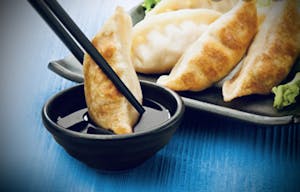 Order 7. Dumpling (Steamed or Fried) (8) food online from Iron Wok store, Kansas City on bringmethat.com