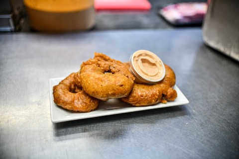 Order Bacon Wrapped Beer Battered Onion Rings food online from The Outskirts store, Columbus on bringmethat.com