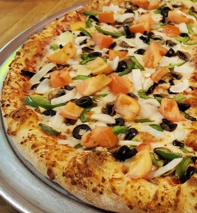 Order White Veggie Pizza - 10" food online from Wild Tiger Pizza store, Seattle on bringmethat.com