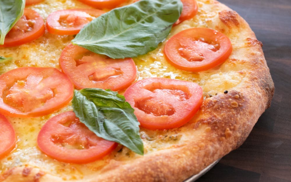 Order Margherita Pizza - Medium 12" food online from Russo New York Pizzeria store, Houston on bringmethat.com