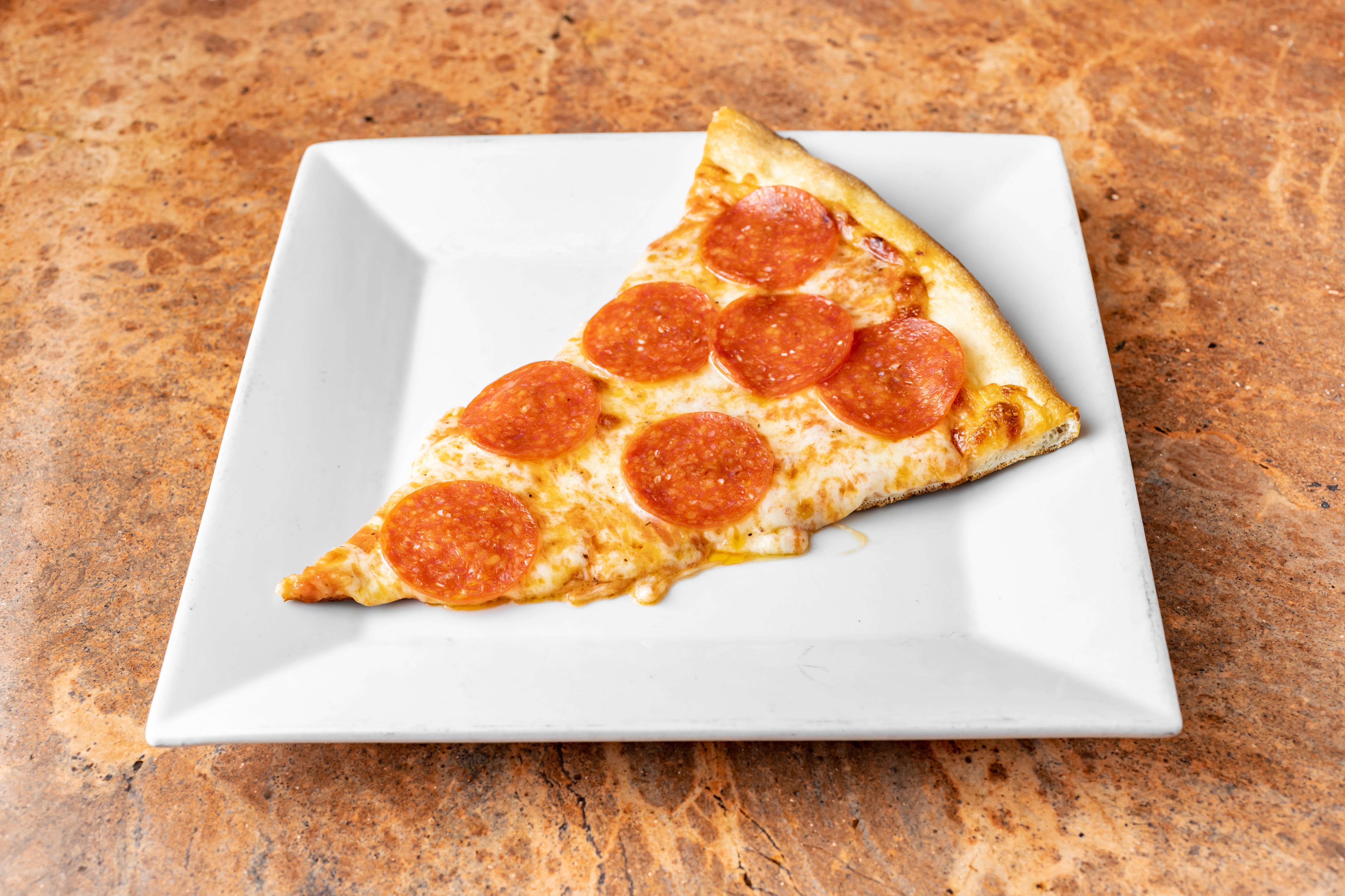 Order One Topping Pizza - 8 Slices food online from Bonbino's Pizza store, Oceanside on bringmethat.com