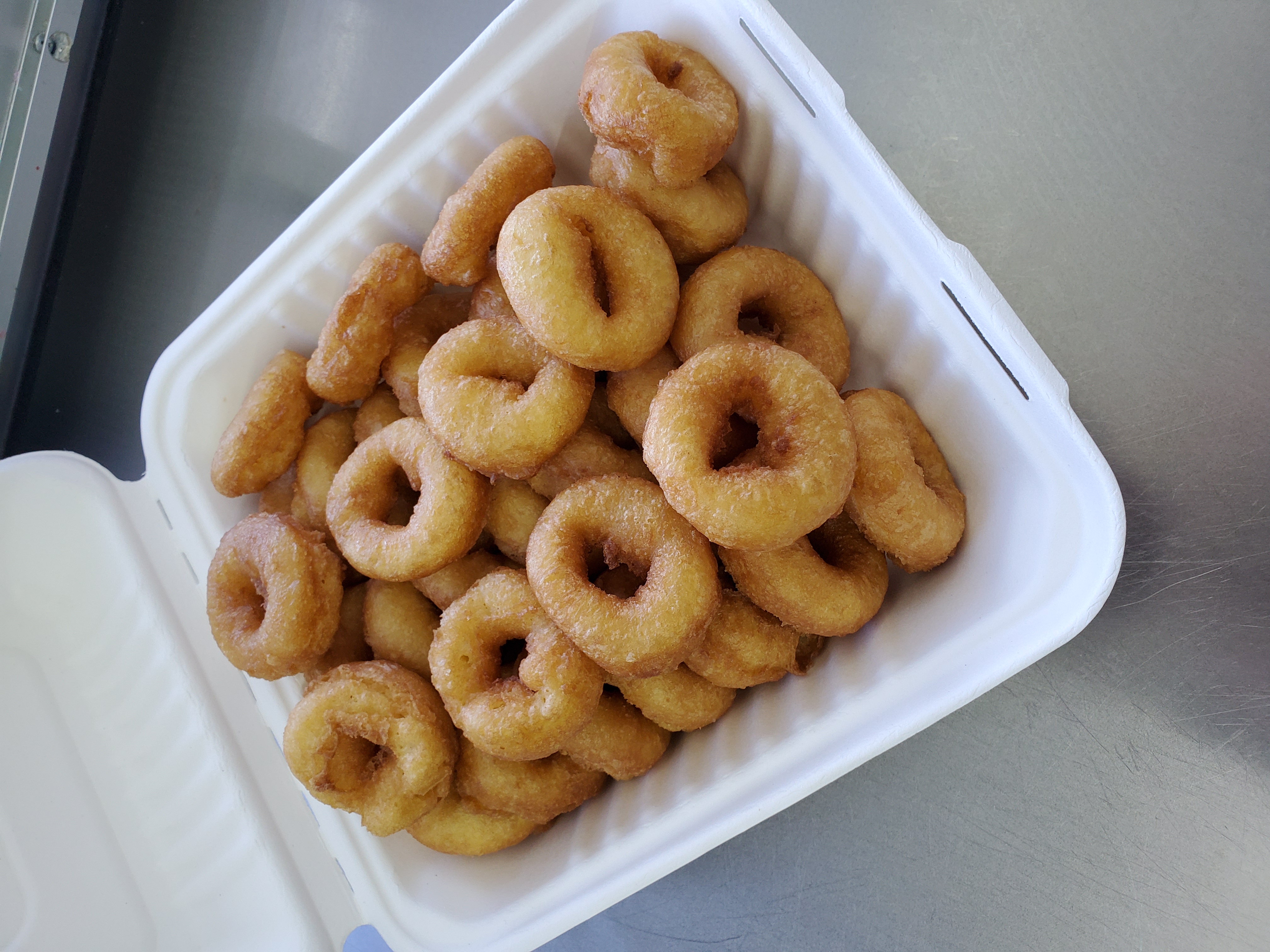 Order Two and a half Dozen food online from Sugared Moose Mini Donuts store, Idaho Falls on bringmethat.com