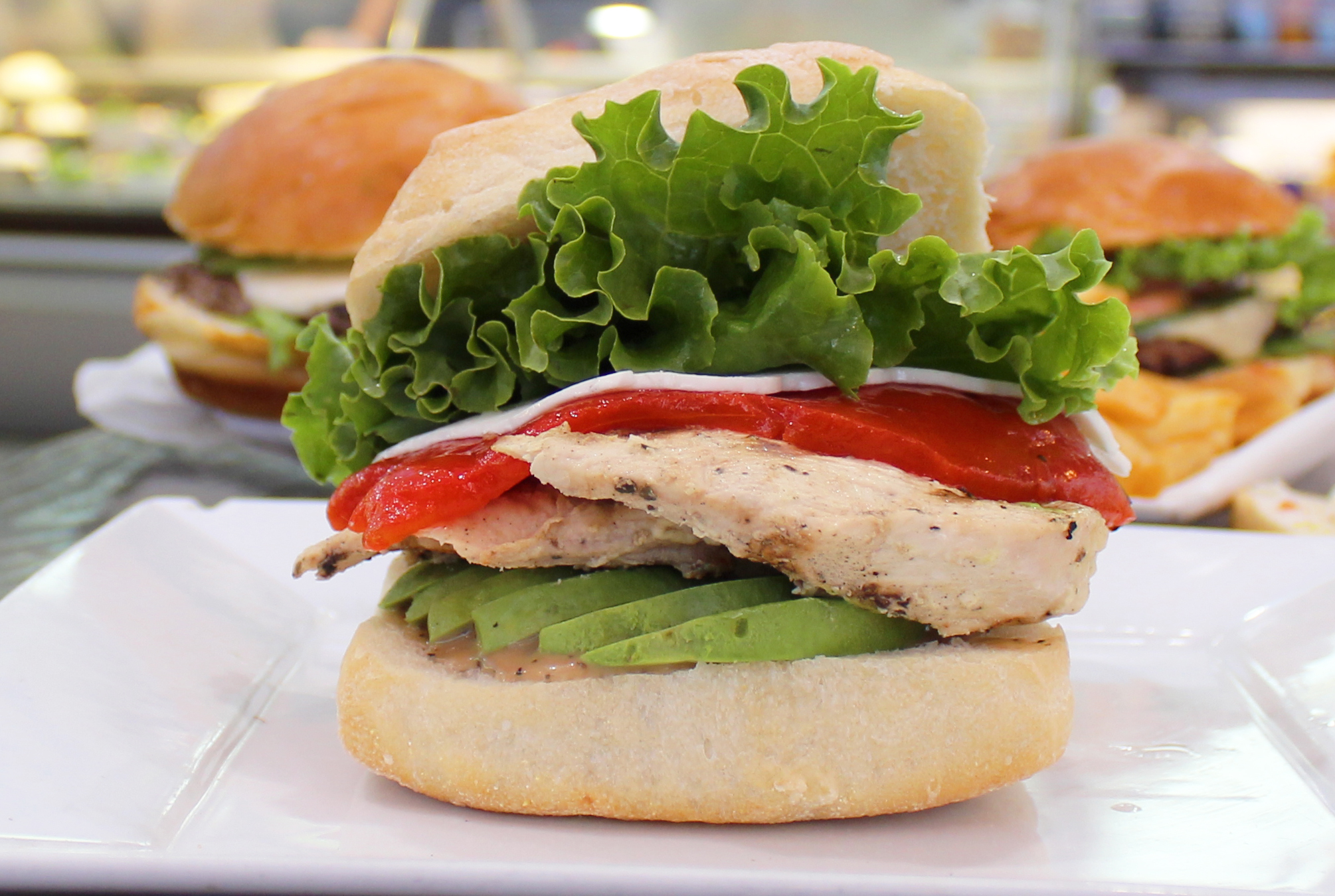 Order M2. Grilled Chicken and Avocado Sandwich food online from Green Cafe store, New York on bringmethat.com