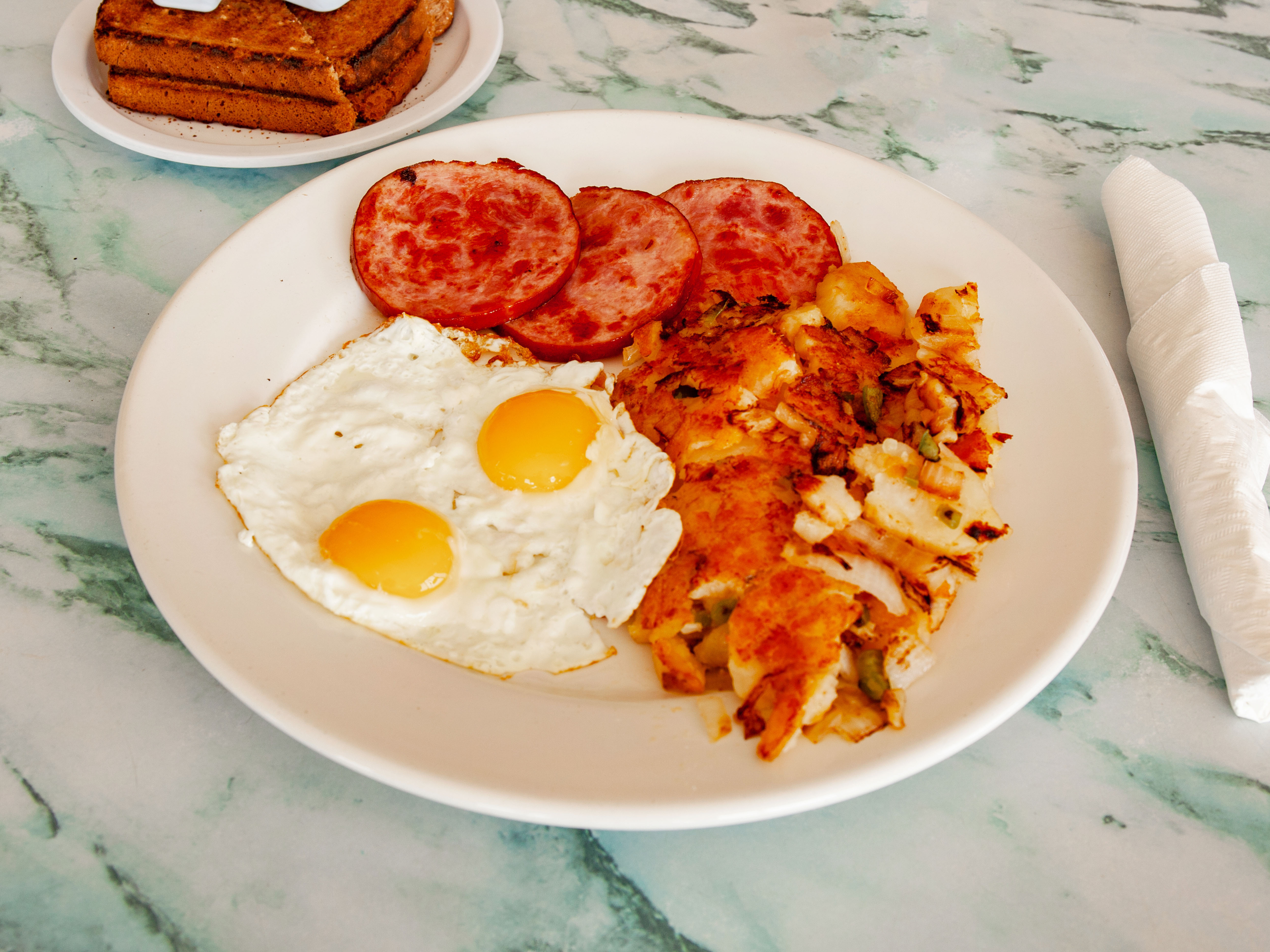 Order 2 Eggs with Canadian Bacon Breakfast food online from Scotty On The Strand store, Hermosa Beach on bringmethat.com