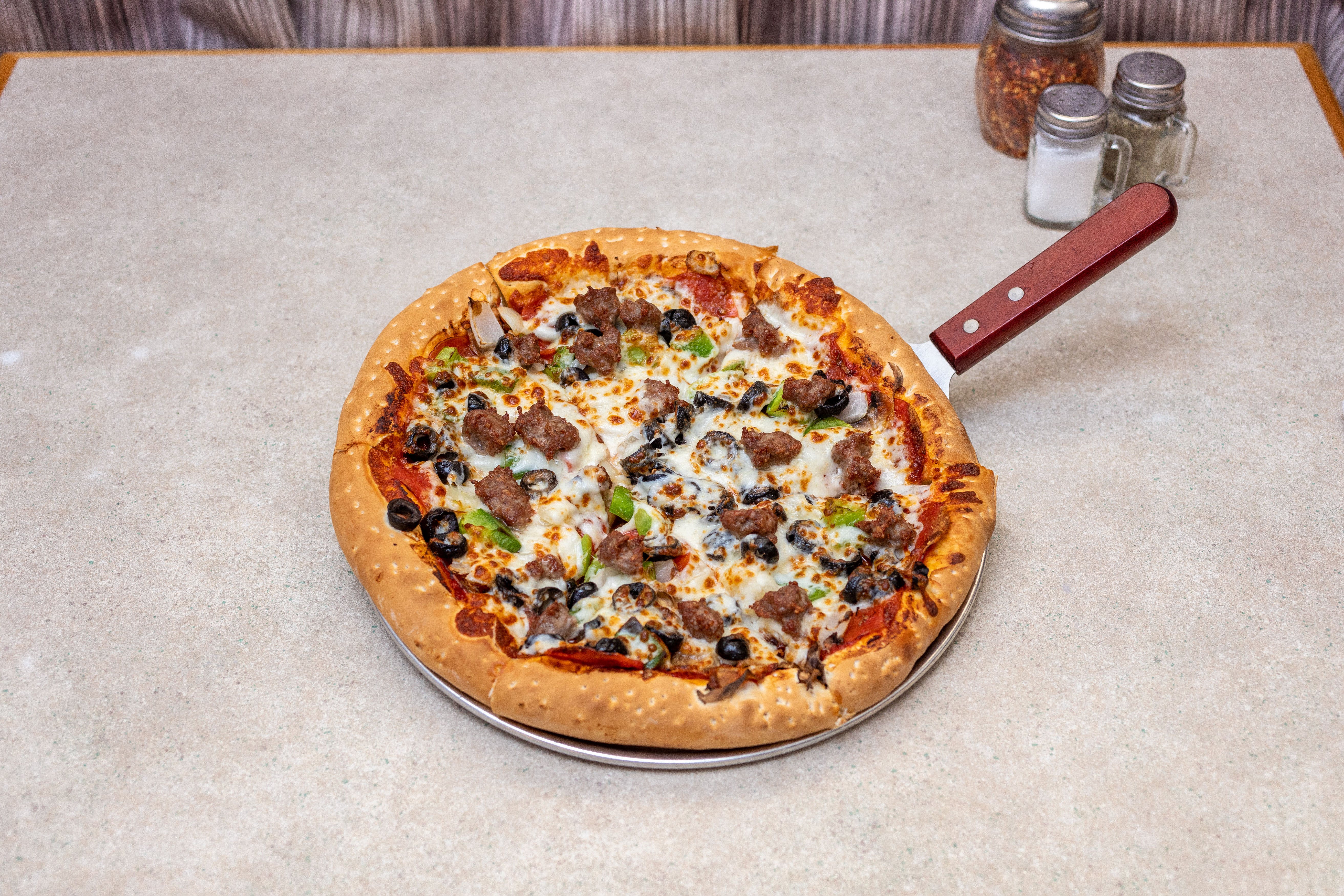 Order The Kitchen Sink Pizza - Mini 7" food online from Saucy's Pizza store, Littleton on bringmethat.com