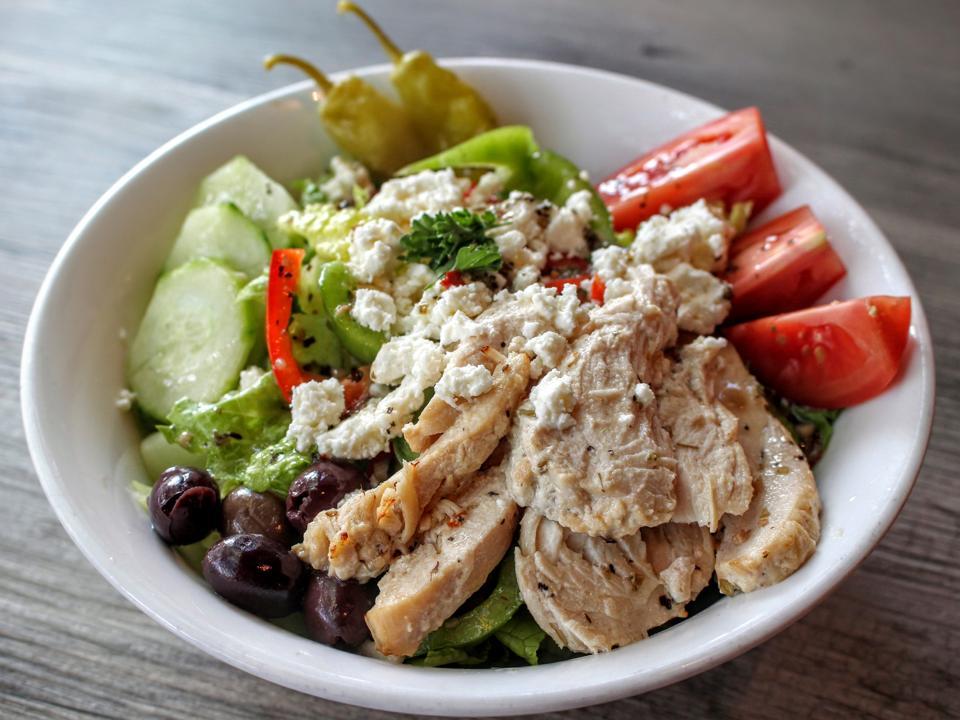 Order Greek Salad food online from Domani Pizzeria & Restaurant store, Seattle on bringmethat.com