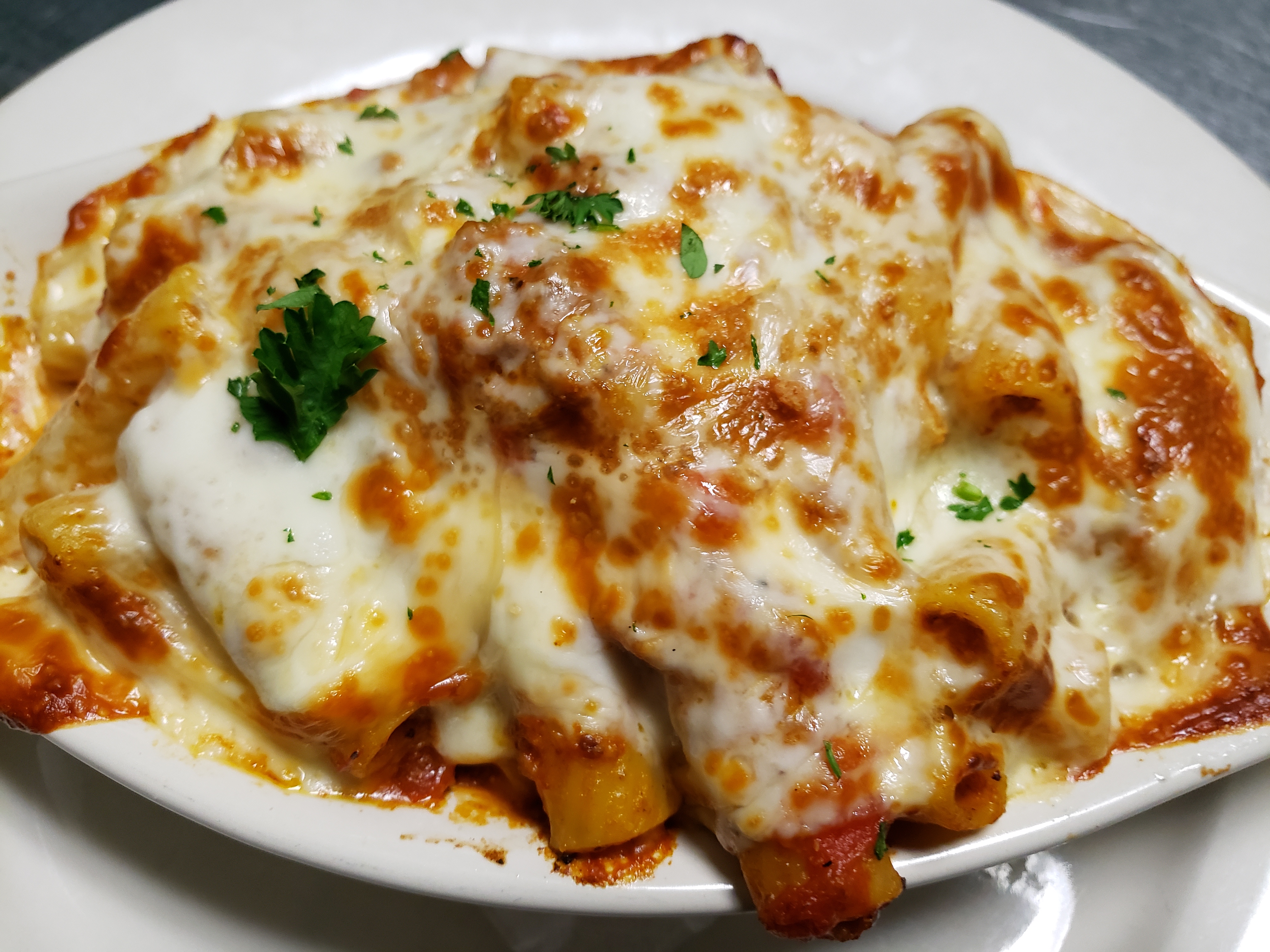 Order Baked Rigatoni food online from Amiccis store, Baltimore on bringmethat.com