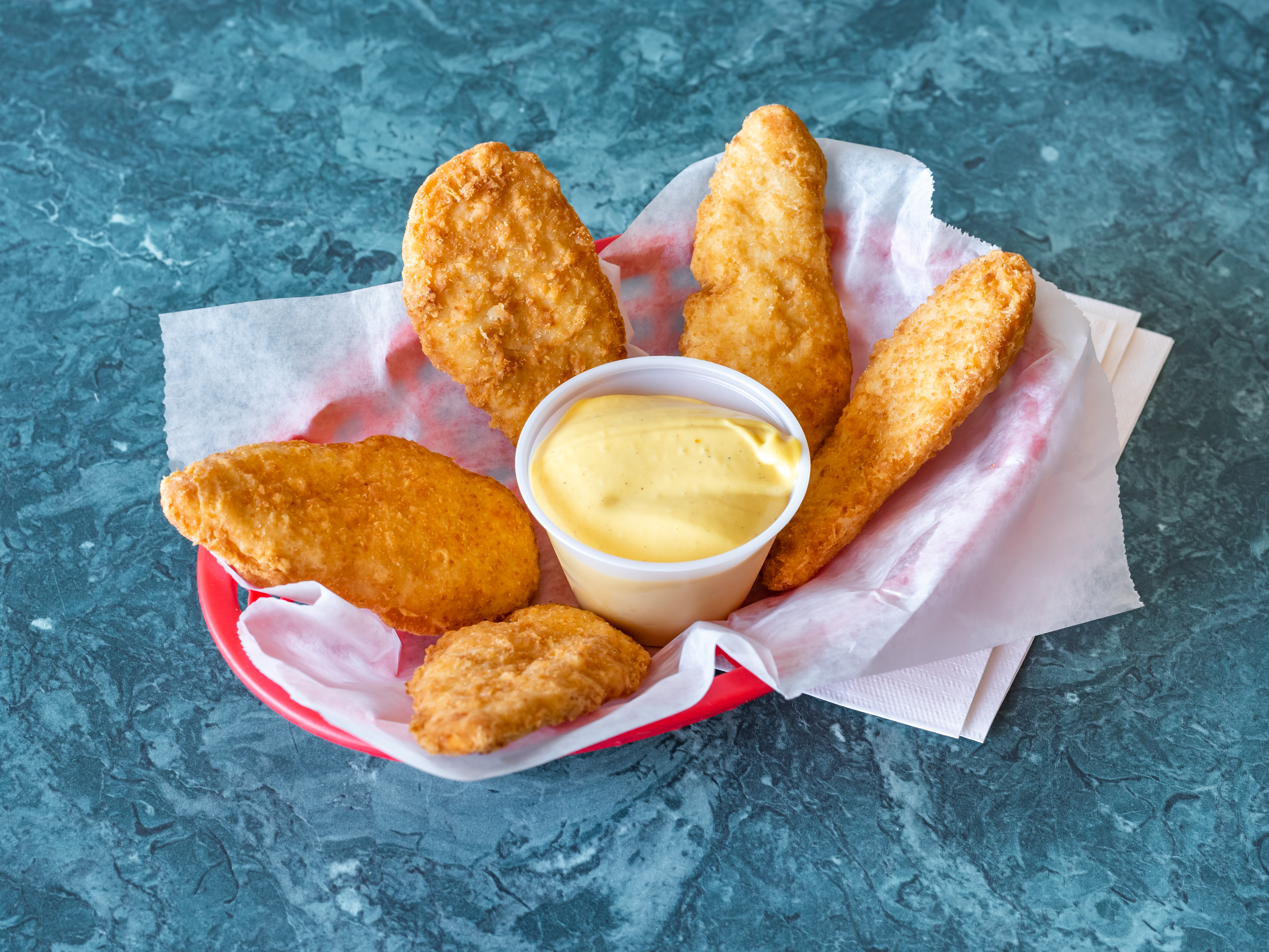 Order Chicken Tenders food online from Guidos Pizza store, Eatontown on bringmethat.com