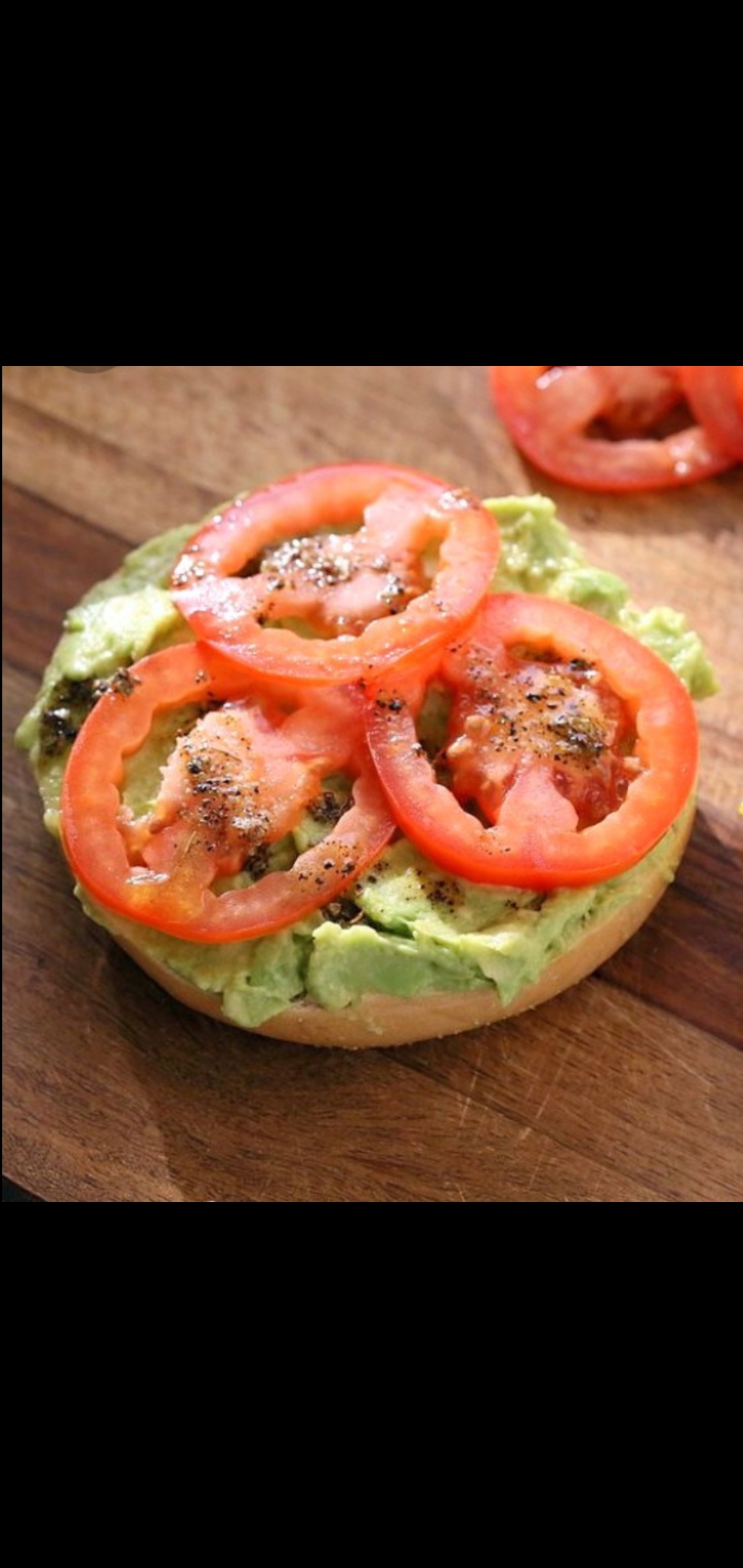 Order Bagel With Avocado And Tomatoes  food online from American Gourmet Foods Deli store, New York on bringmethat.com