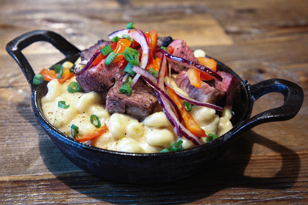 Order Tri-Tip Loaded Mac & Cheese food online from Buckhorn Grill store, San Francisco on bringmethat.com