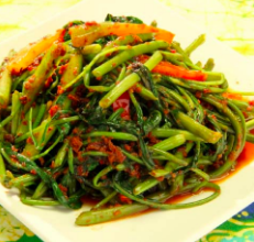 Order 100. Kangkung Belachan food online from Satay malaysian cuisine store, Hoboken on bringmethat.com