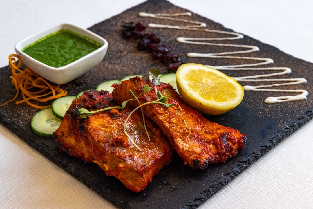 Order Salmon Tikka food online from Spice symphony store, New York on bringmethat.com