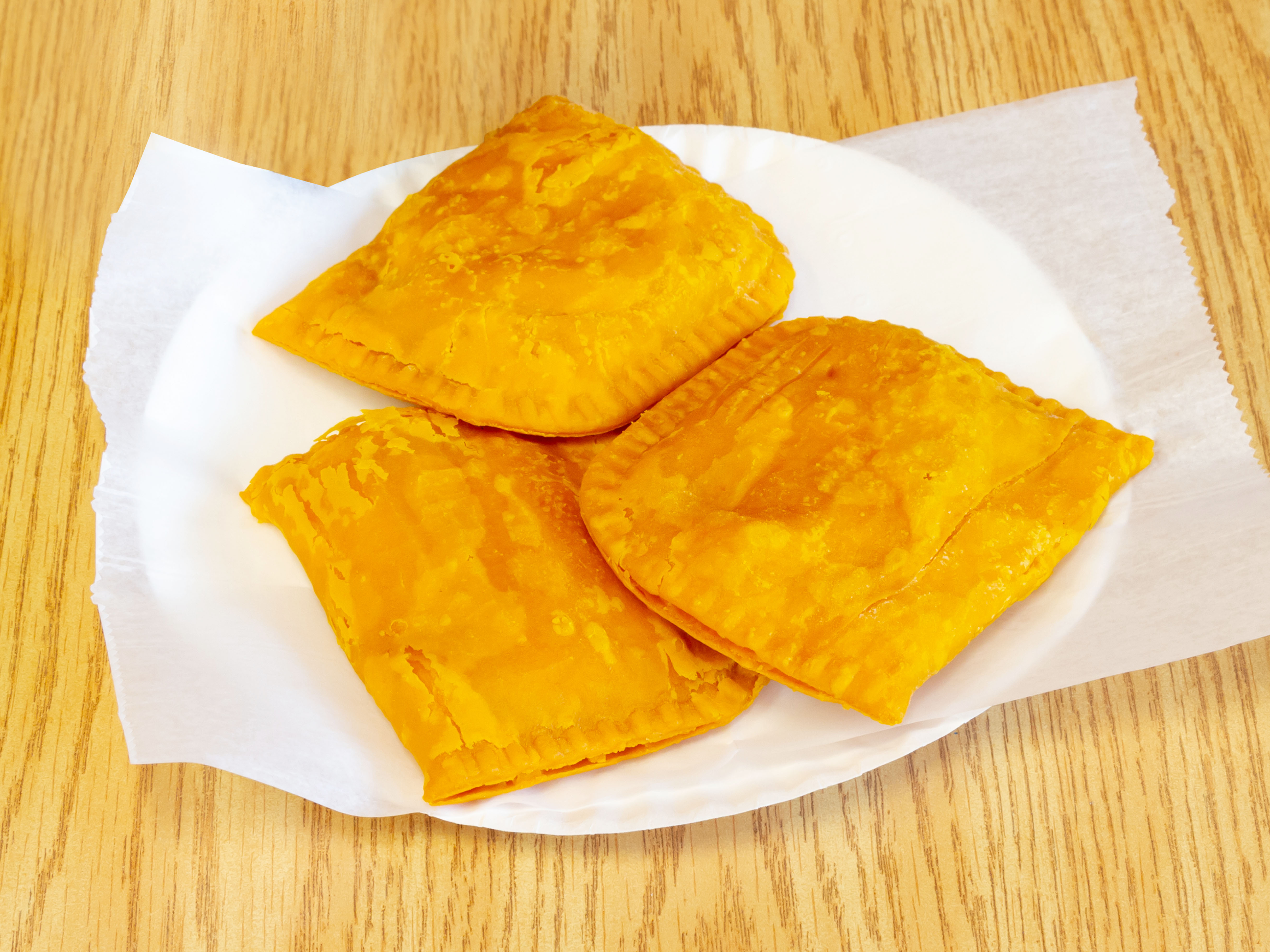 Order 104. Jamaican Beef Patty food online from Crown Fried Chicken store, Worcester on bringmethat.com