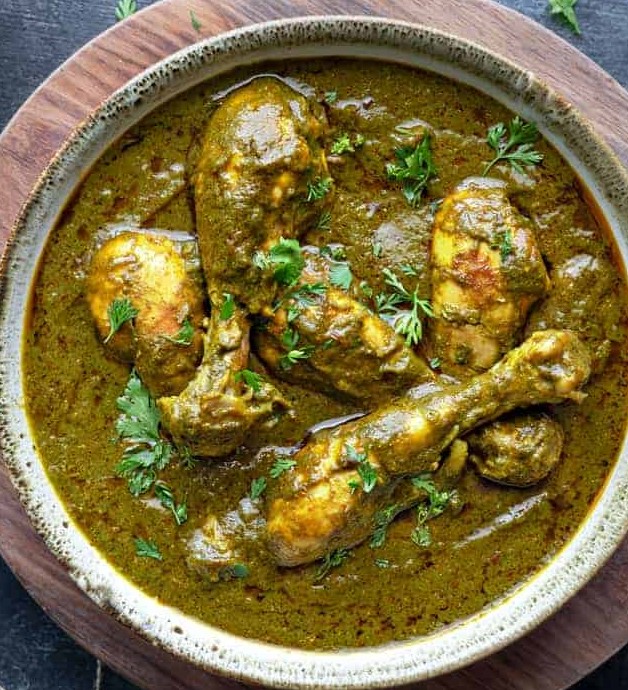 Order Saag Chicken food online from Ruchi Indian Restaurant store, Bellevue on bringmethat.com