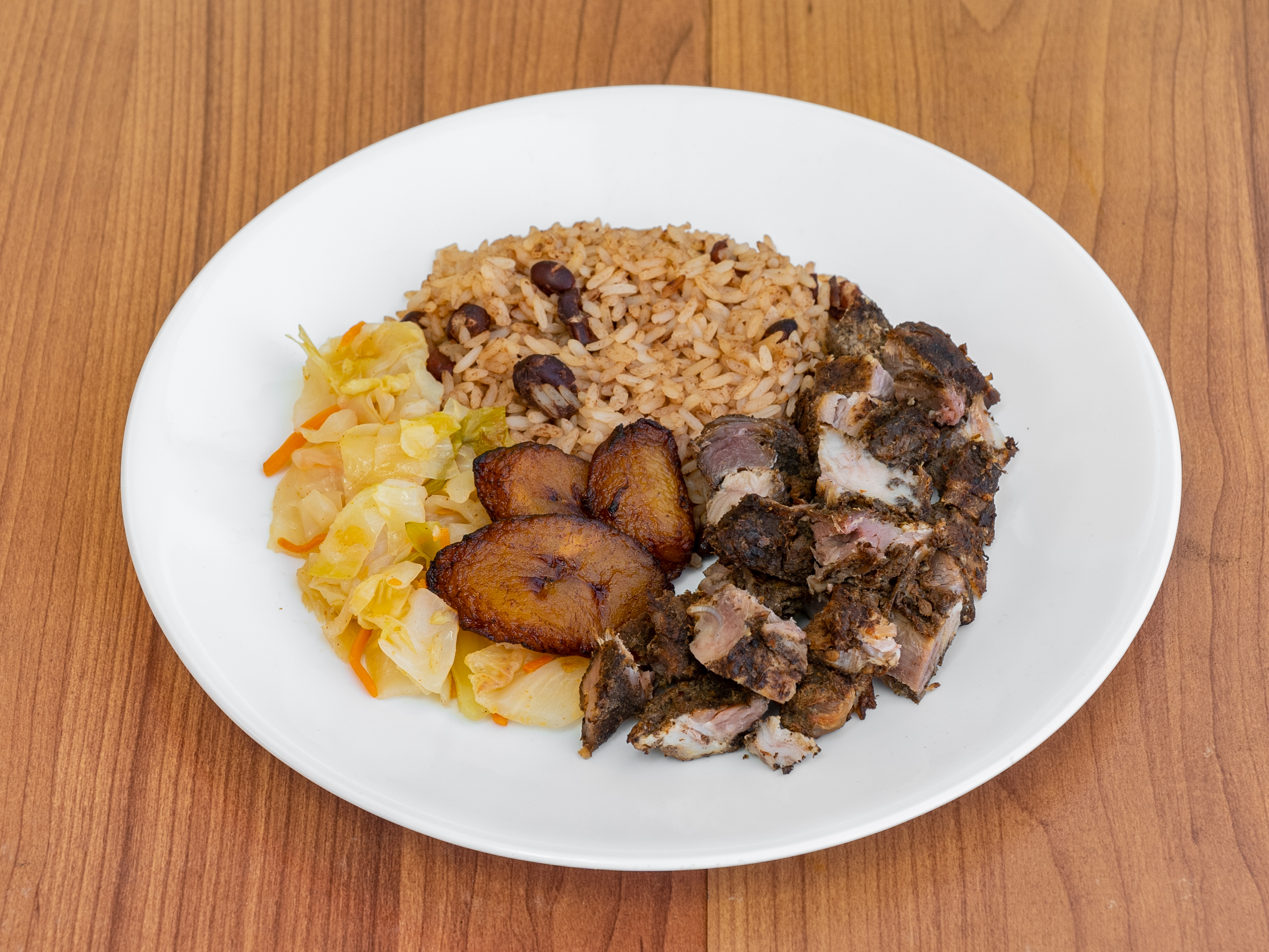 Order Jerk Pork by the pound food online from Mby Jamaican Cuisine store, Powder Springs on bringmethat.com