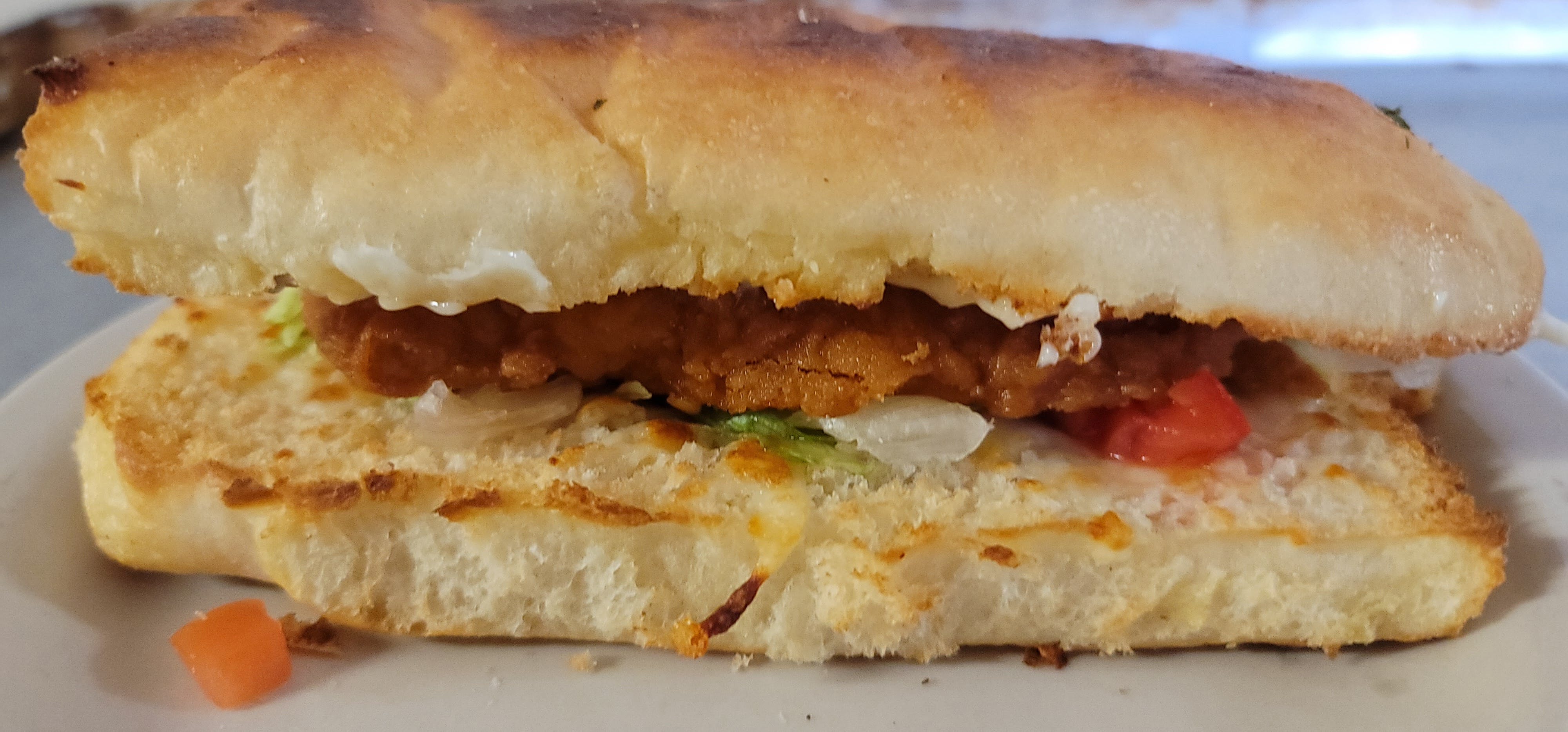 Order Fried Chicken Po Boy Sandwich - Half food online from The Pizza Den store, Hoxie on bringmethat.com