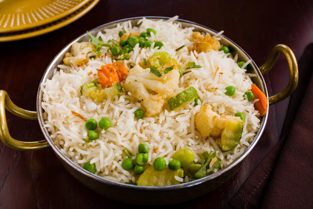 Order Amritsari Pulav food online from Dhaba indian cuisine store, New York on bringmethat.com