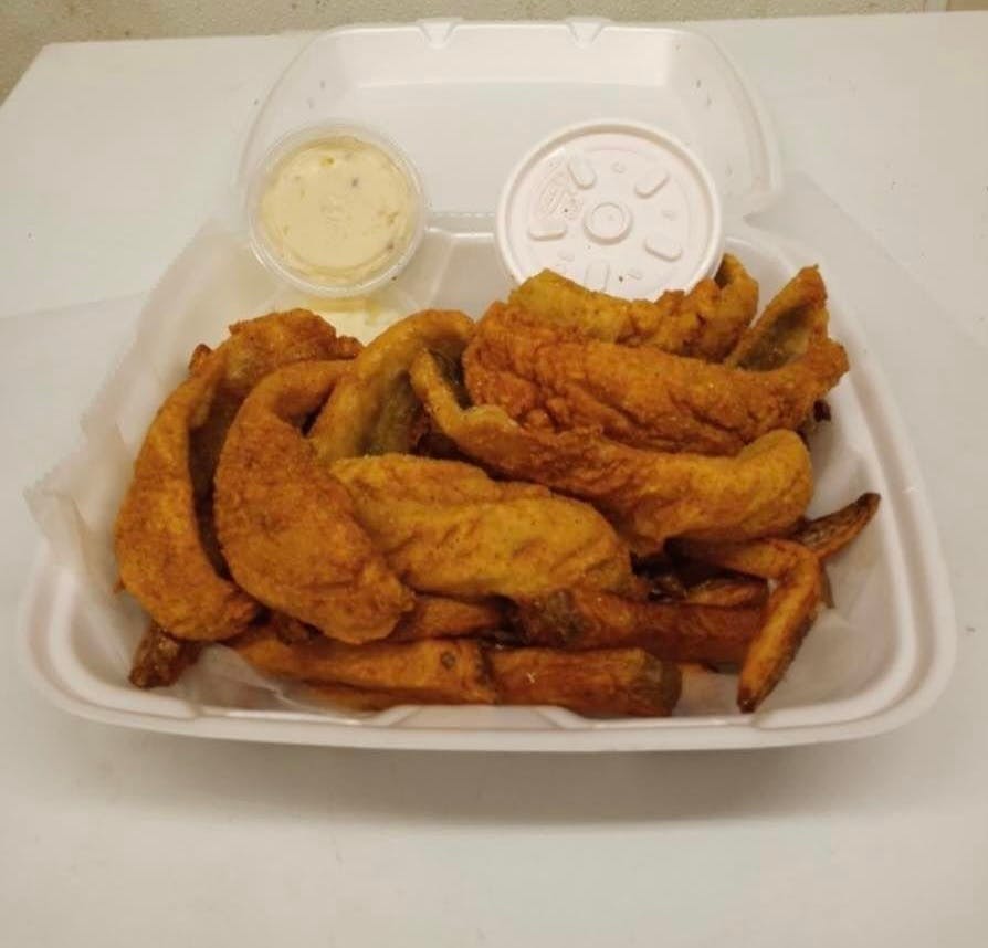 Order Half Pound Lake Perch Dinner - 1/2 lb. food online from Big D Pizza store, Clyde on bringmethat.com