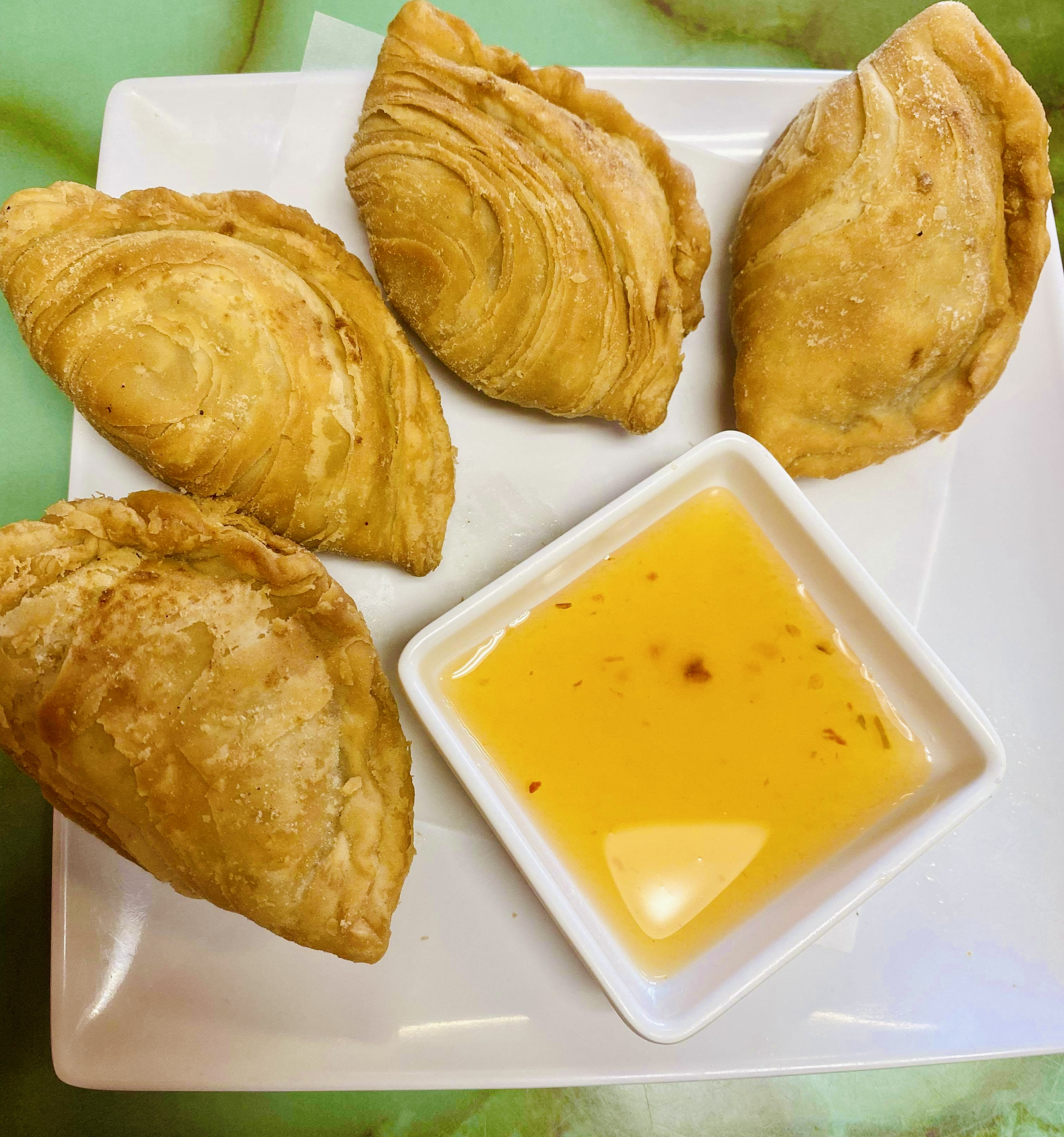 Order 14. Chicken Curry Puff food online from Thai Pakse Restaurant store, Fort Worth on bringmethat.com