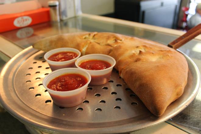 Order Large Calzone food online from Italian Bistro store, Summerville on bringmethat.com