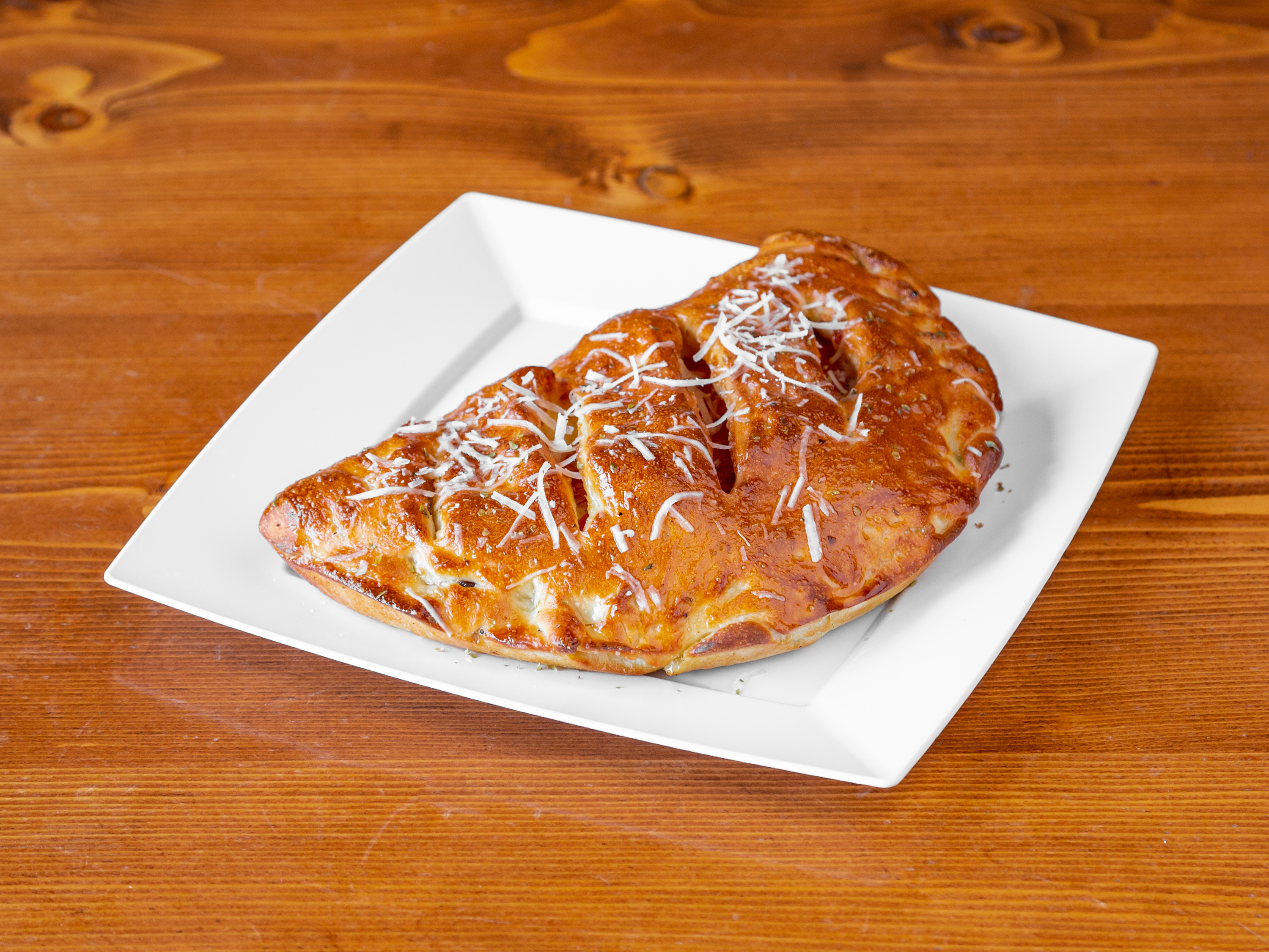 Order Calzones food online from Bada Bing Pizza store, Painesville on bringmethat.com