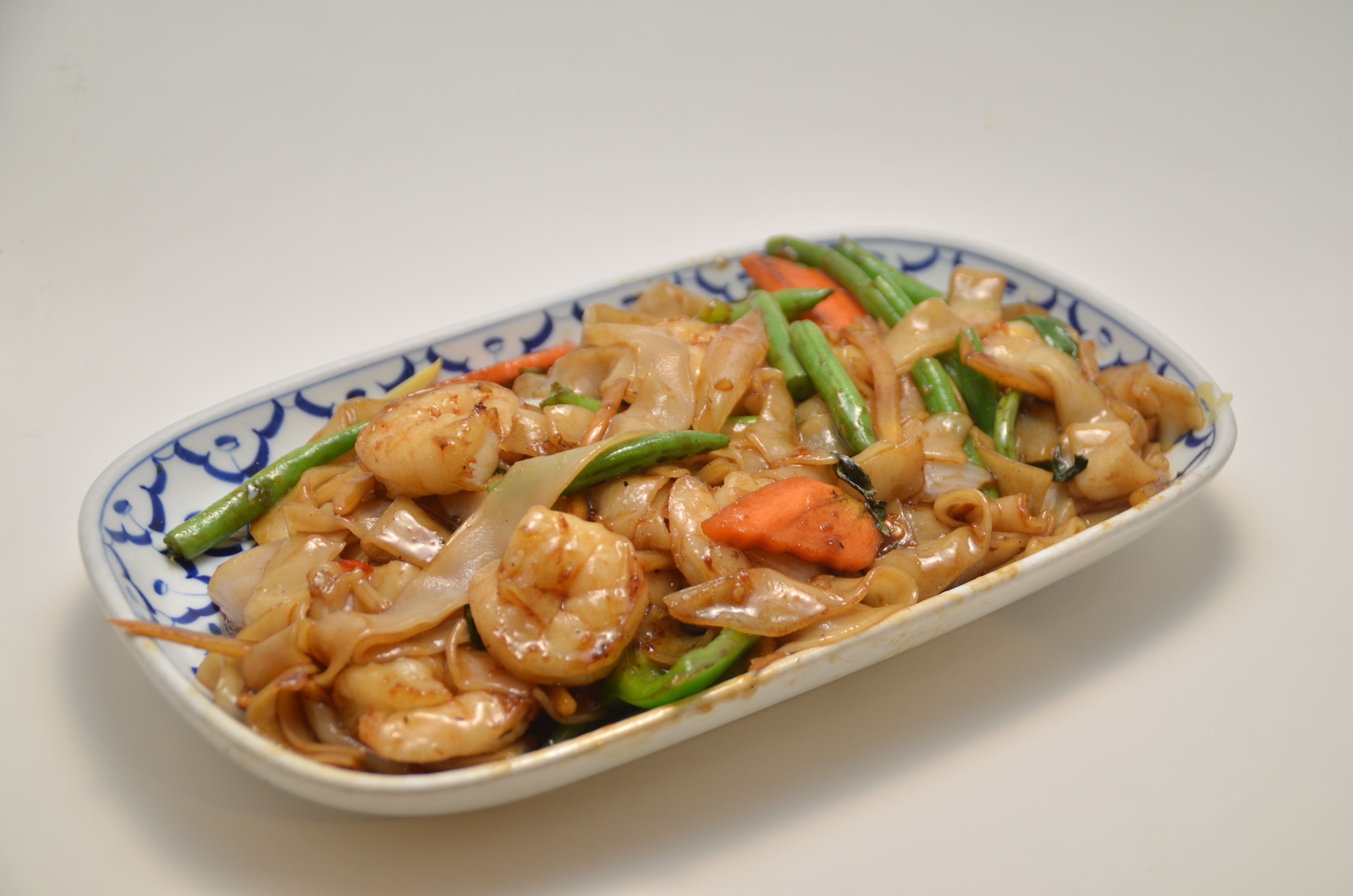 Order 25. Drunken Noodle food online from Thai Village store, Houston on bringmethat.com