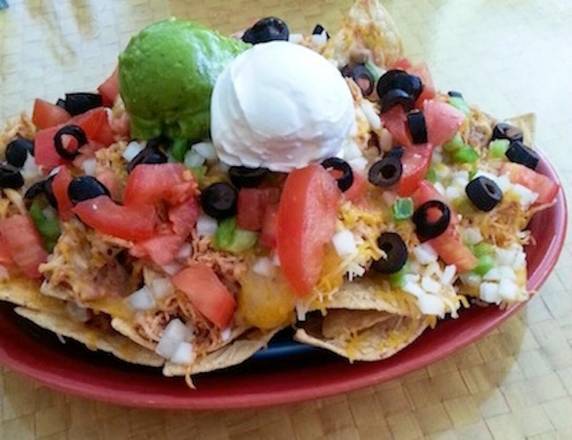 Order Nacho Grande food online from Tios Mexican Cafe store, Columbia on bringmethat.com