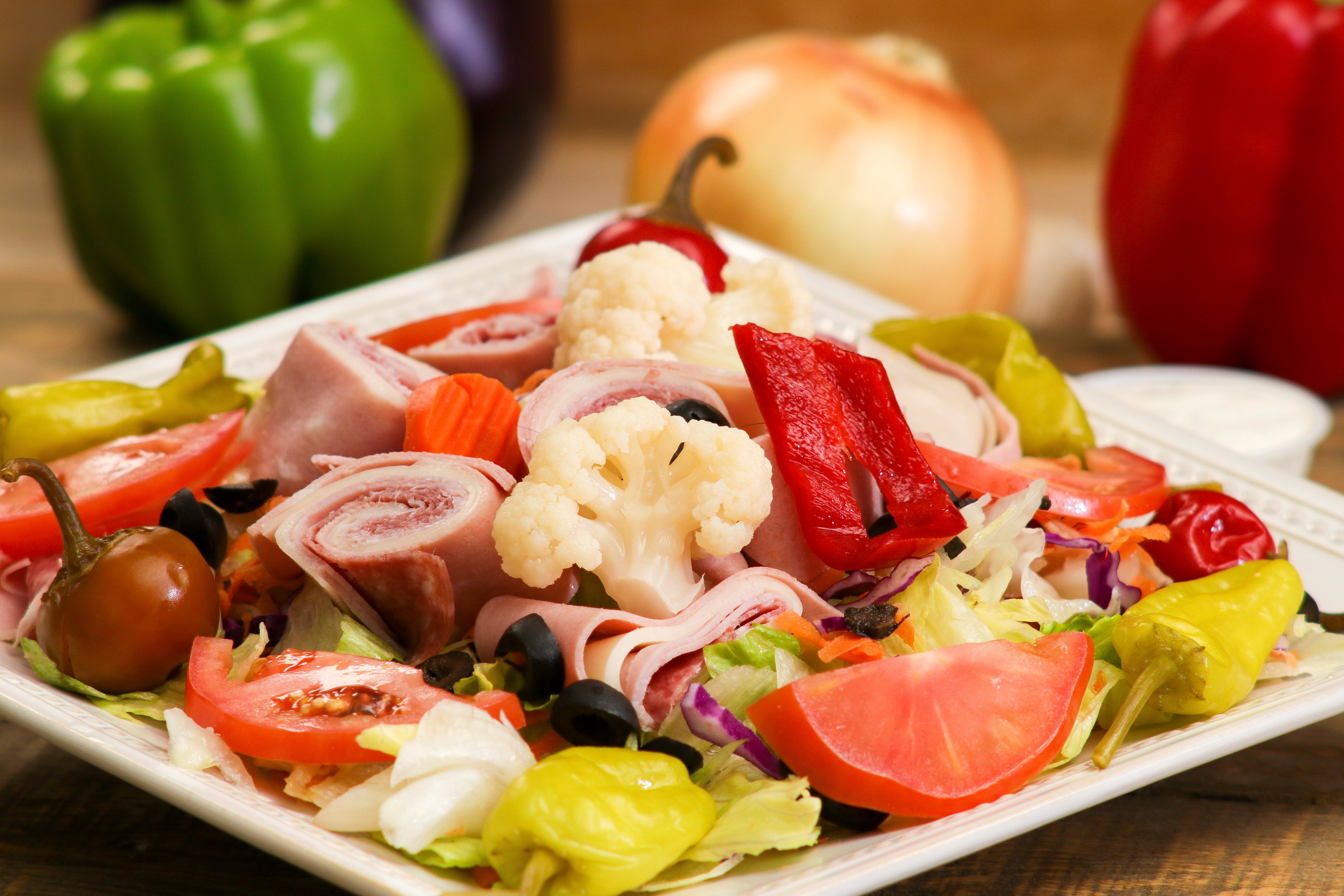 Order Antipasto Salad - Salad food online from Ameci Pizza & Pasta store, Canyon Country on bringmethat.com