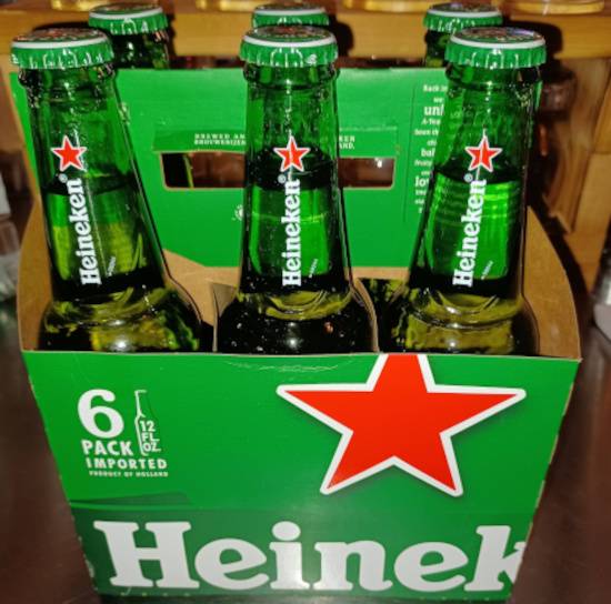 Order Heineken 6pm 12oz. bottles (5.0% ABV) food online from Colbert Trading Co store, Colbert on bringmethat.com