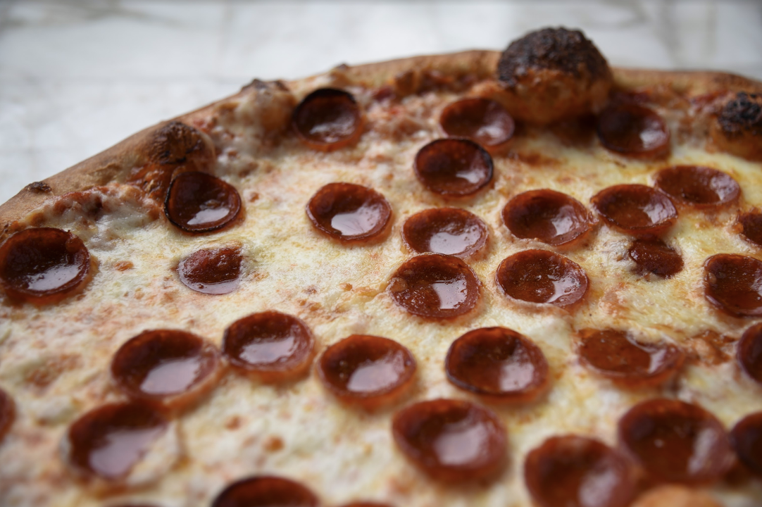 Order Pepperoni food online from Dimo's Pizza store, Chicago on bringmethat.com