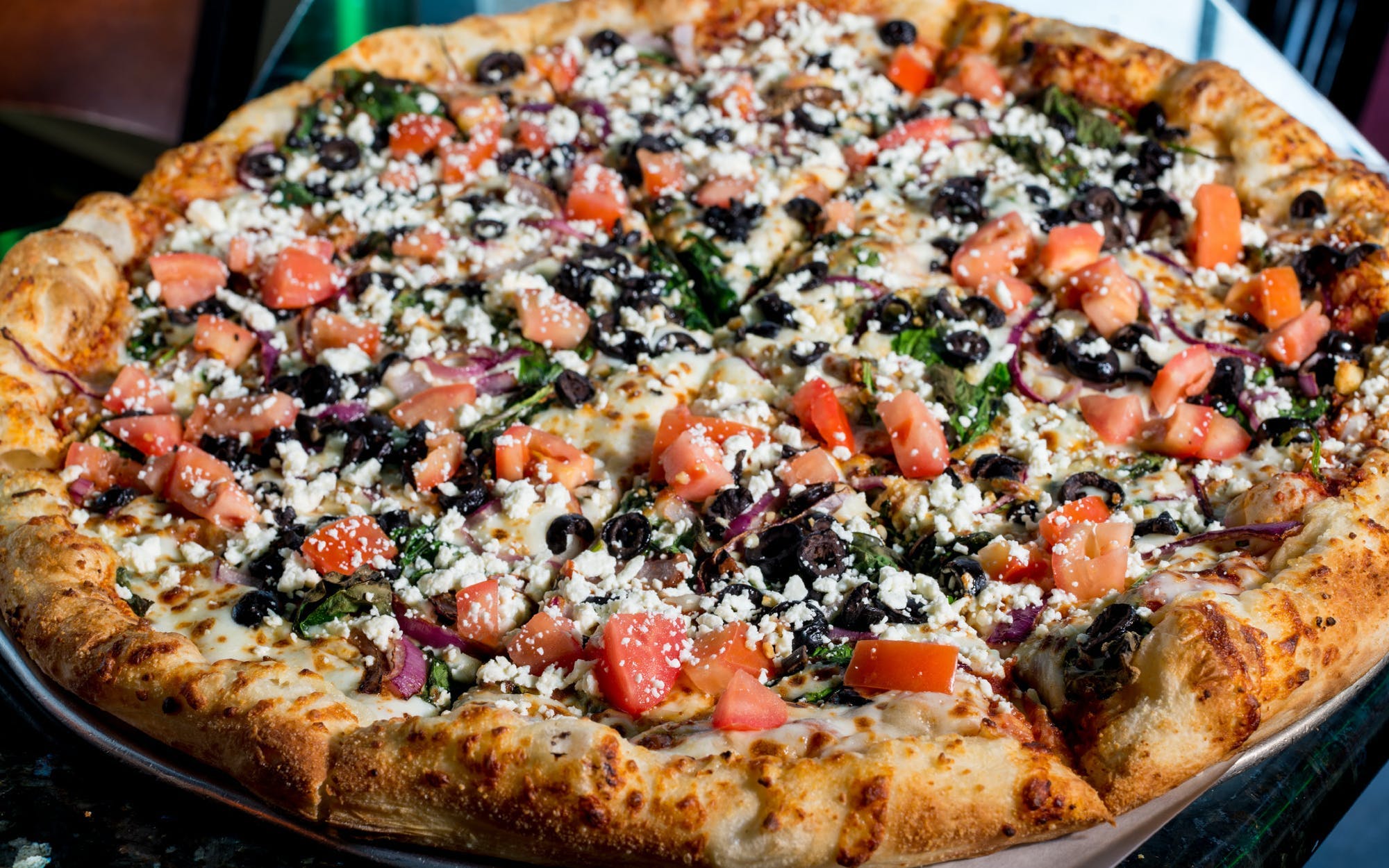 Order Greek Veggie Pizza - Medium 12" food online from Schmizza Pub & Grub store, Portland on bringmethat.com