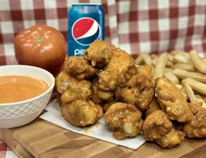Order 7pc Buffalo
  Wings and a 12oz Pepsi Product food online from Manny & Olga Pizza store, Washignton on bringmethat.com