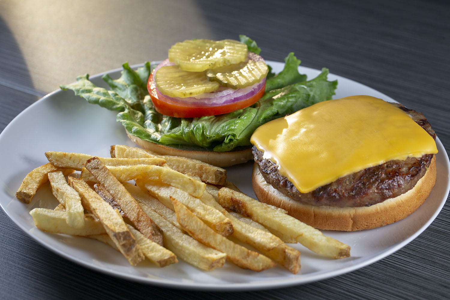 Order 42. Cheeseburger food online from Bajis' Down The Street Cafe store, Mountain View on bringmethat.com