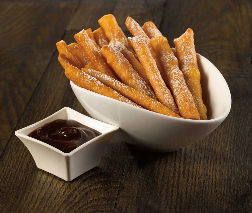 Order Funnel Cake Fries - Appetizer food online from Big D Pizza store, Clyde on bringmethat.com
