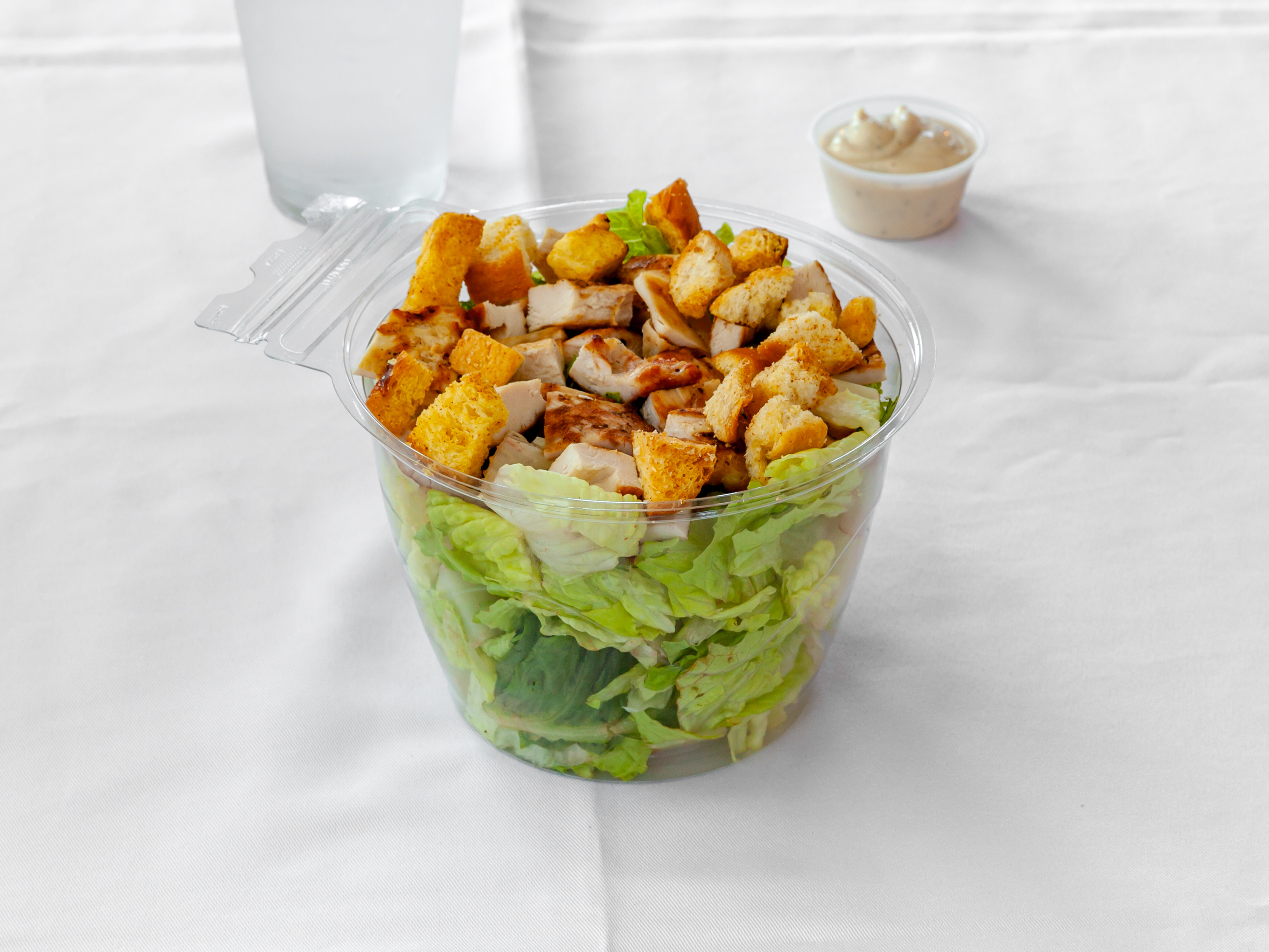 Order Grilled Chicken Caesar Salad food online from Great chicago food & beverage co store, Chicago on bringmethat.com