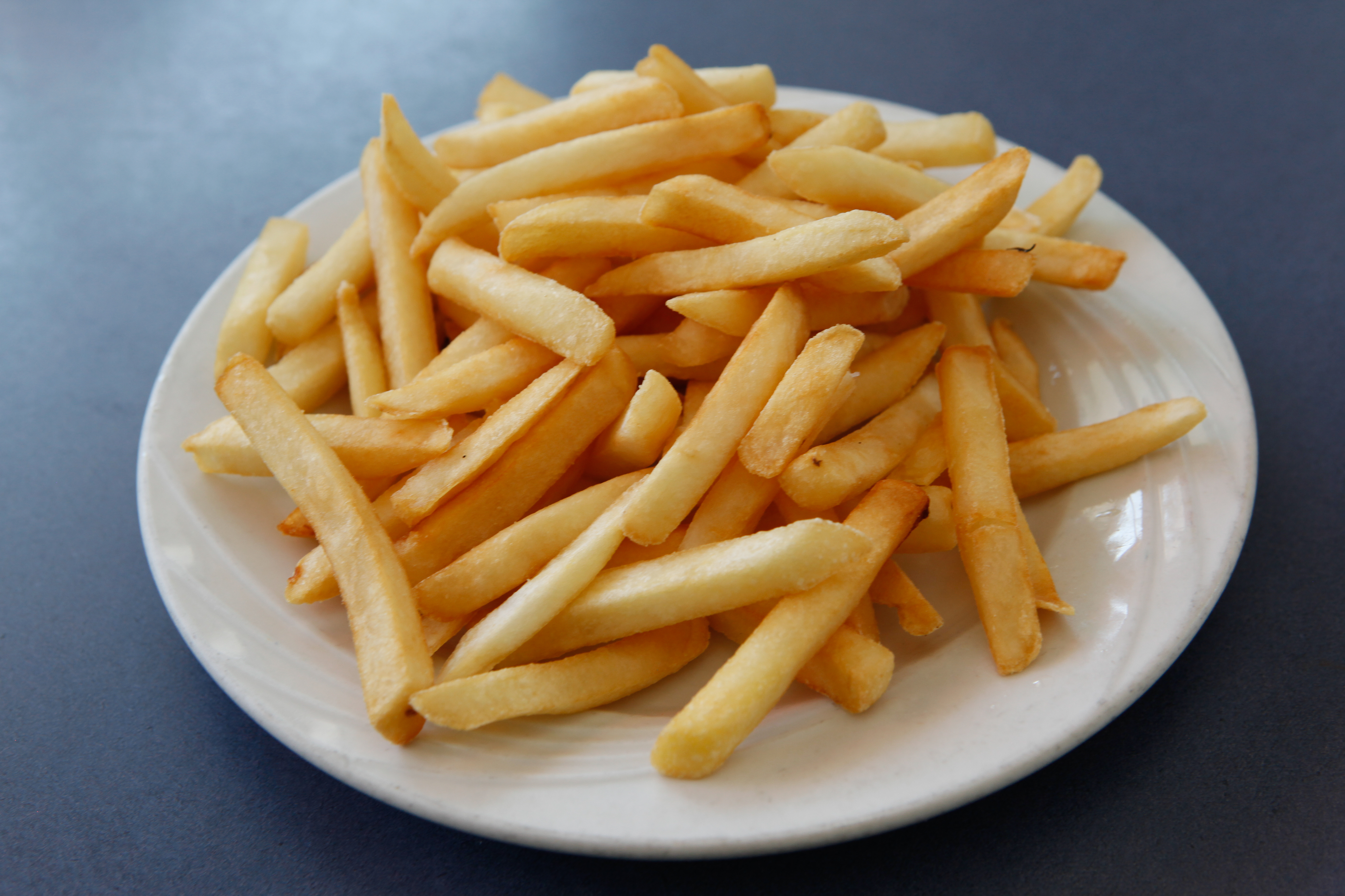 Order French Fries food online from Village Diner store, Kew Gardens on bringmethat.com
