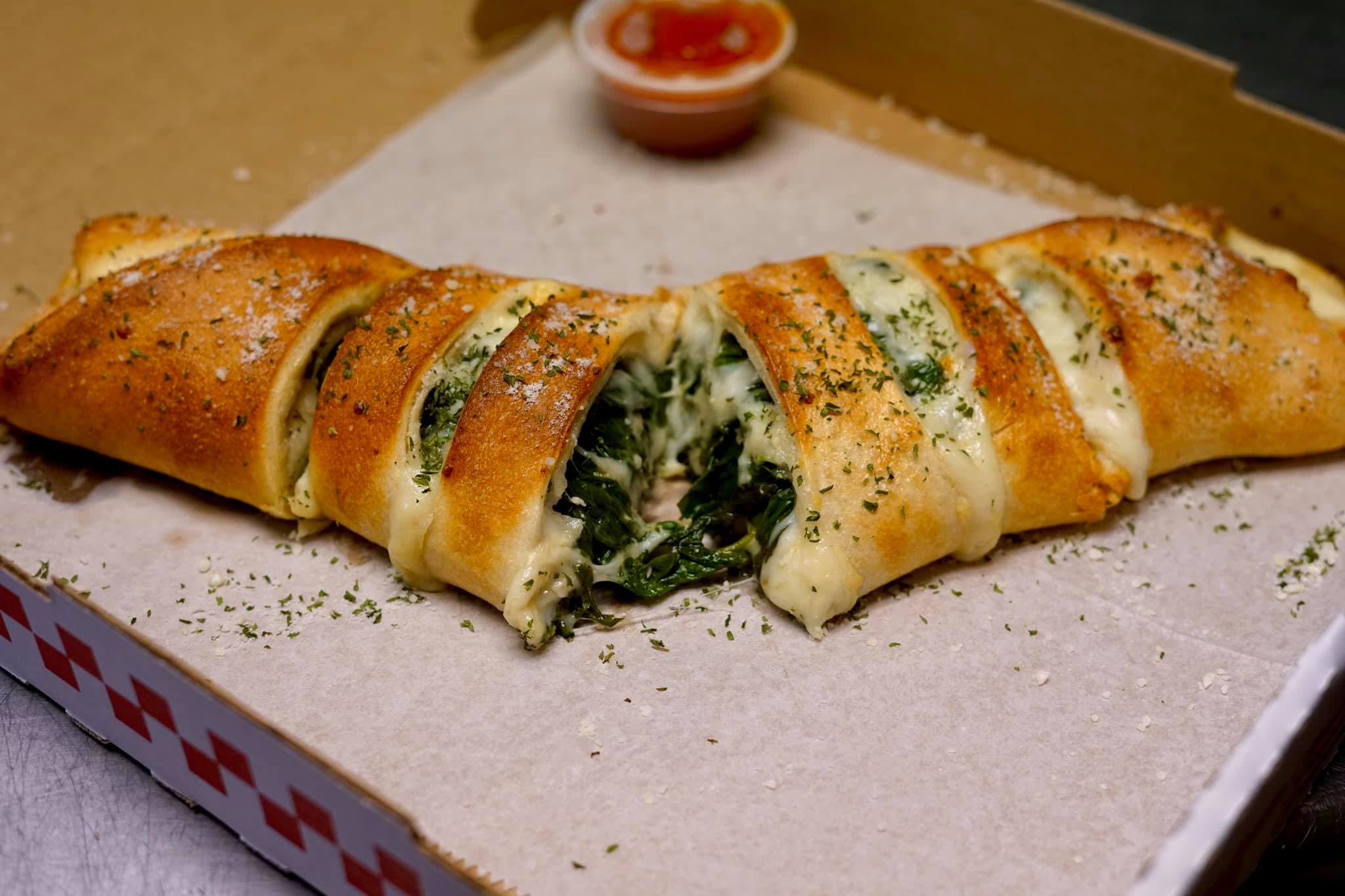 Order Spinach Roll - Small food online from Arelis Italian Restaurant store, Bethlehem on bringmethat.com