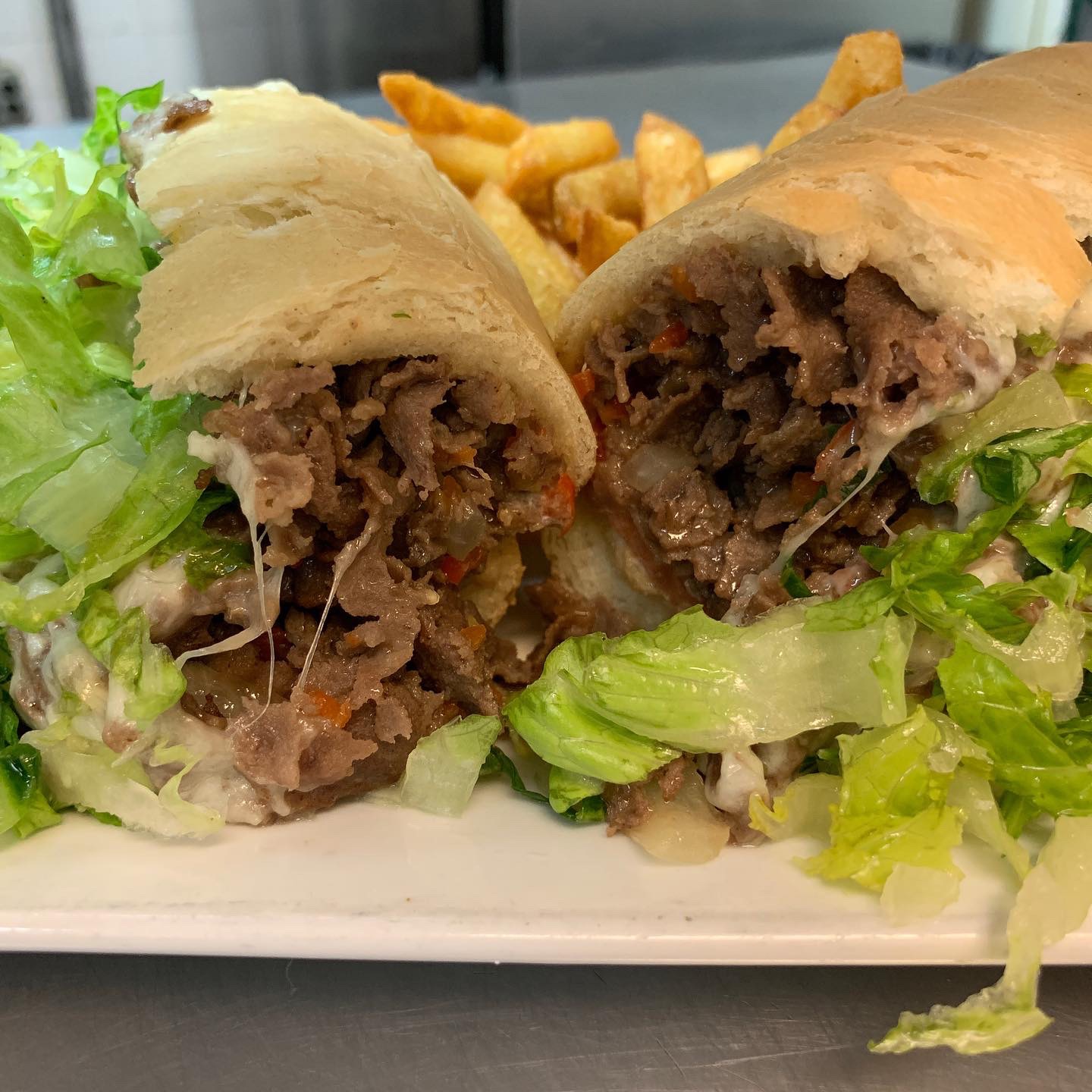 Order Steak and Cheese Warm Sub food online from Lucia's Italian Ristorante store, Herndon on bringmethat.com