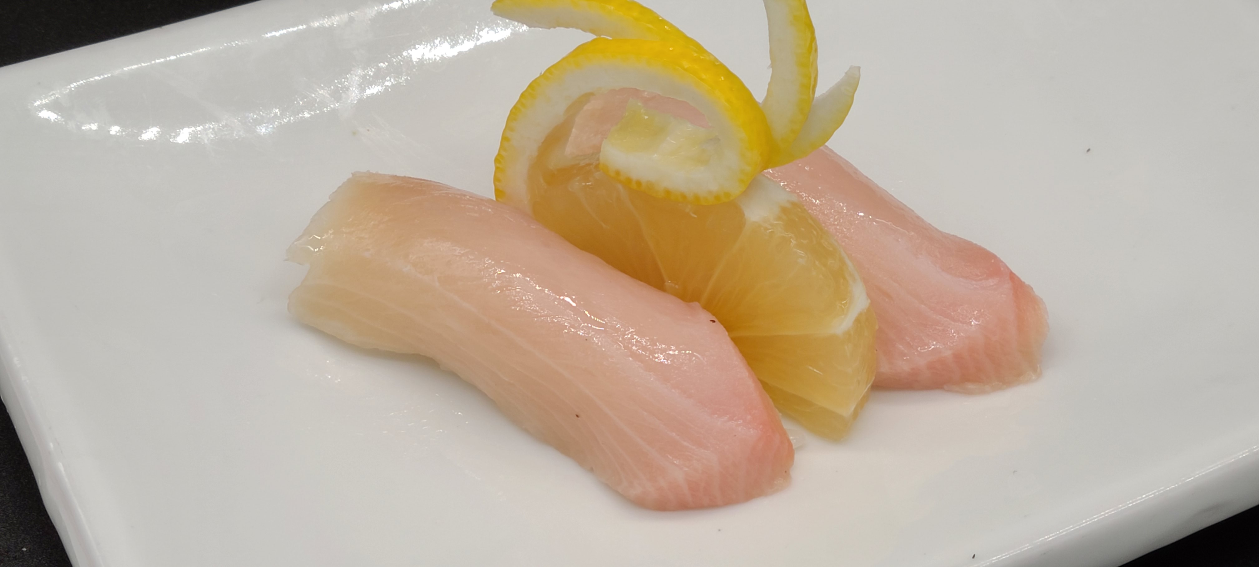 Order N6. Yellowtail Sushi(2pcs) food online from Hello Sushi store, Fullerton on bringmethat.com