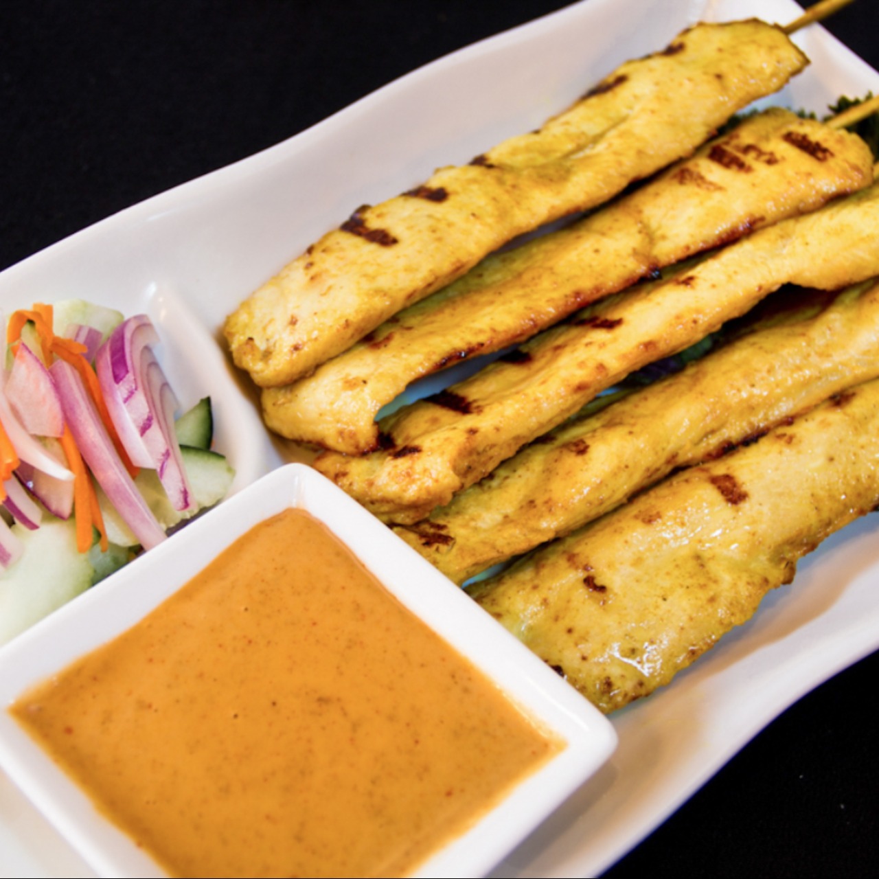 Order Chicken Satay food online from Chabaa Thai Cuisine store, San Francisco on bringmethat.com