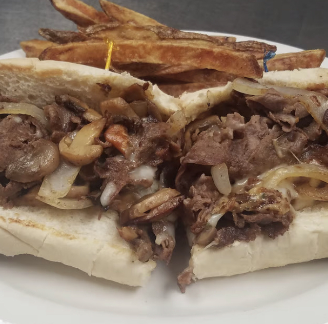 Order Philly Cheesesteak Sandwich food online from Locker Room Bar & Grill store, Broadview Heights on bringmethat.com