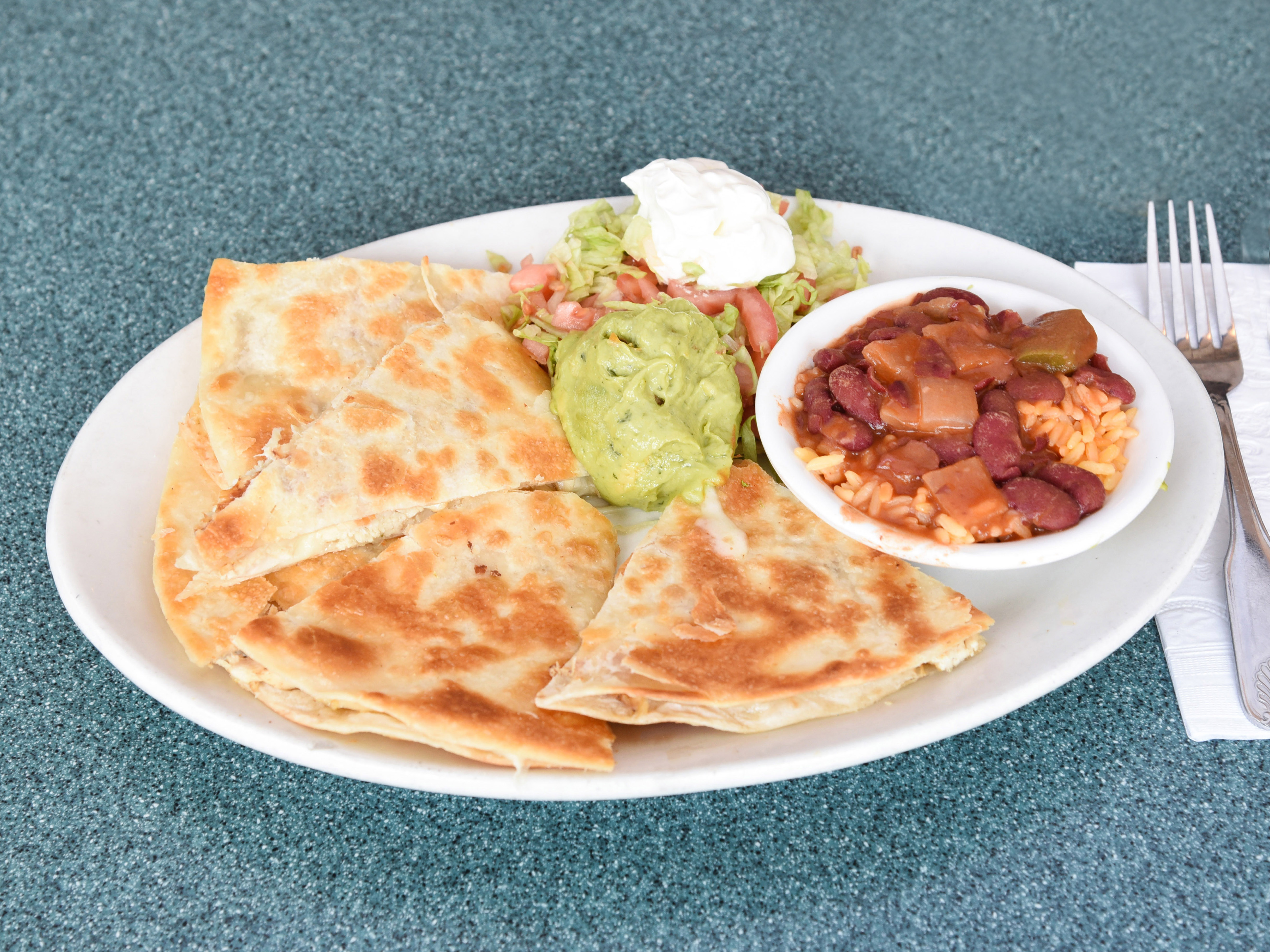 Order Chicken Quesadillas food online from Bedford Park Cafe store, Bronx on bringmethat.com