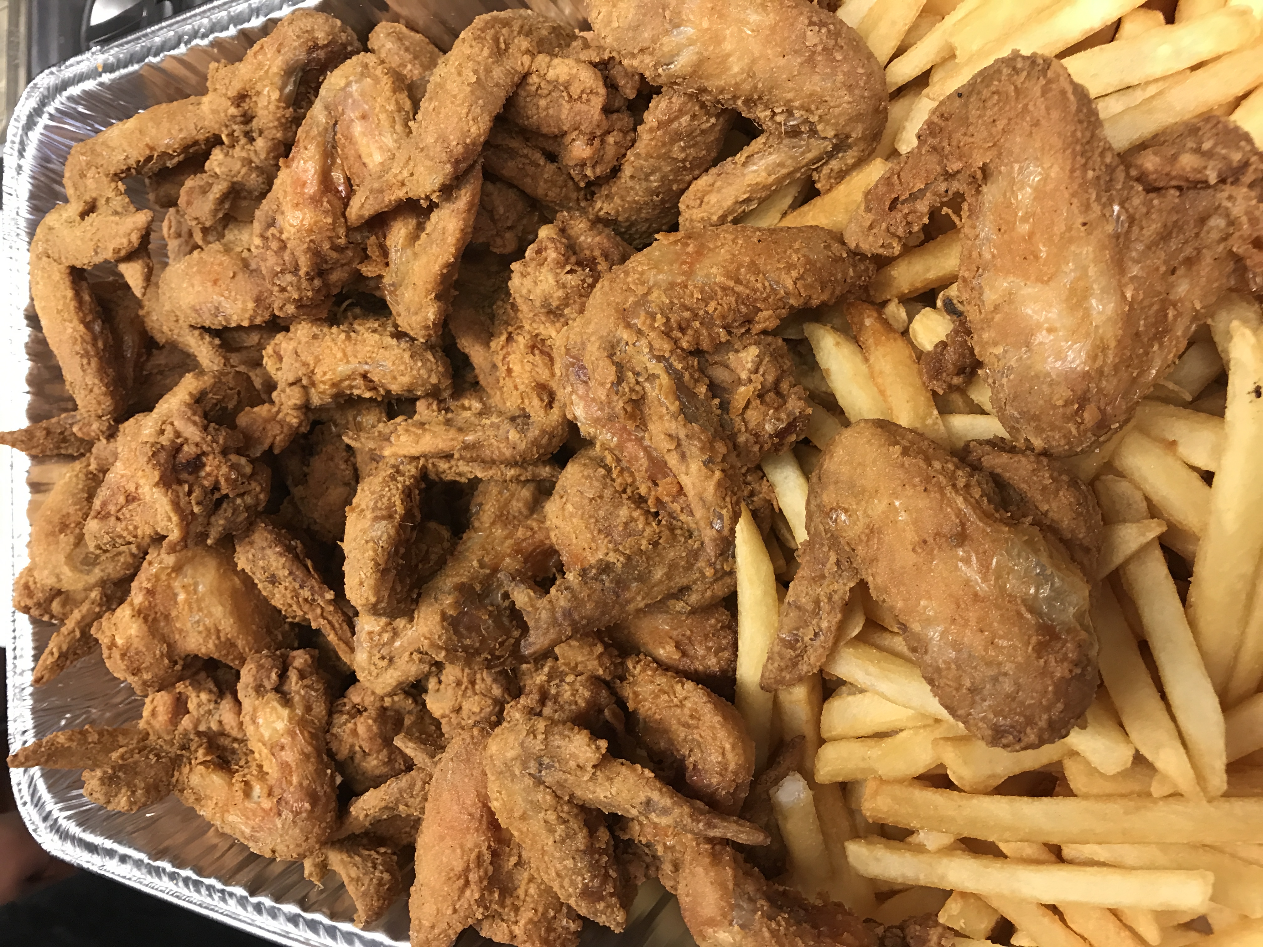 Order 20 Pieces Wings with Fries food online from Rudy's Grill store, Summit Argo on bringmethat.com
