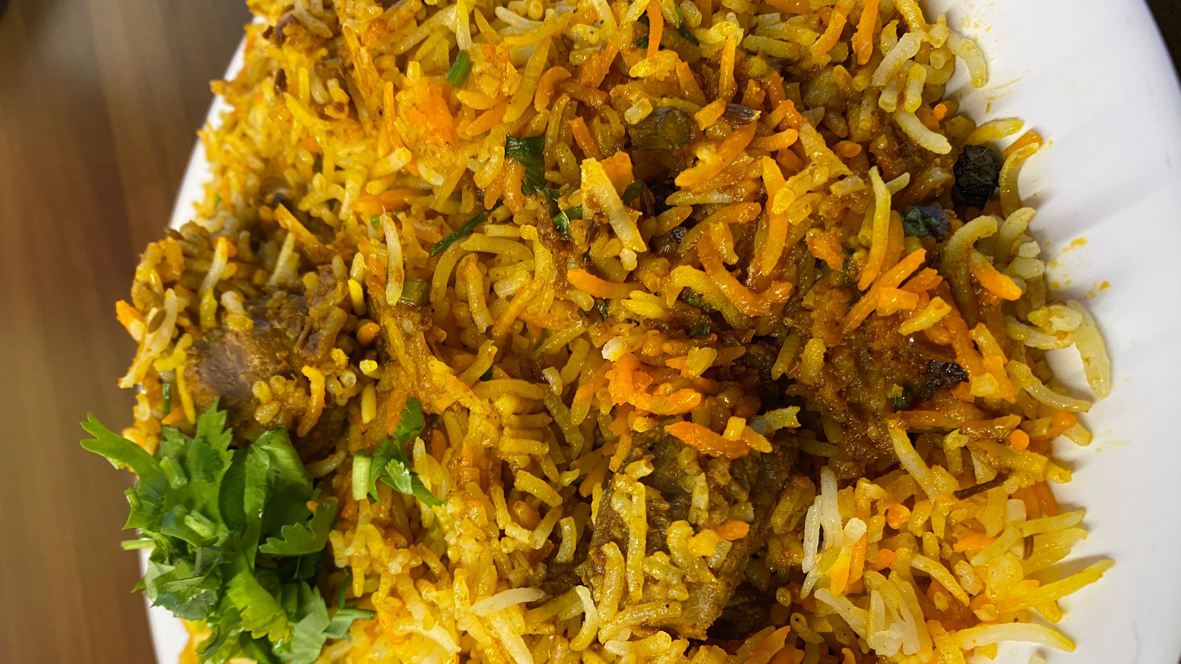 Order Lamb Biryani food online from Indian Cafe store, East Moline on bringmethat.com