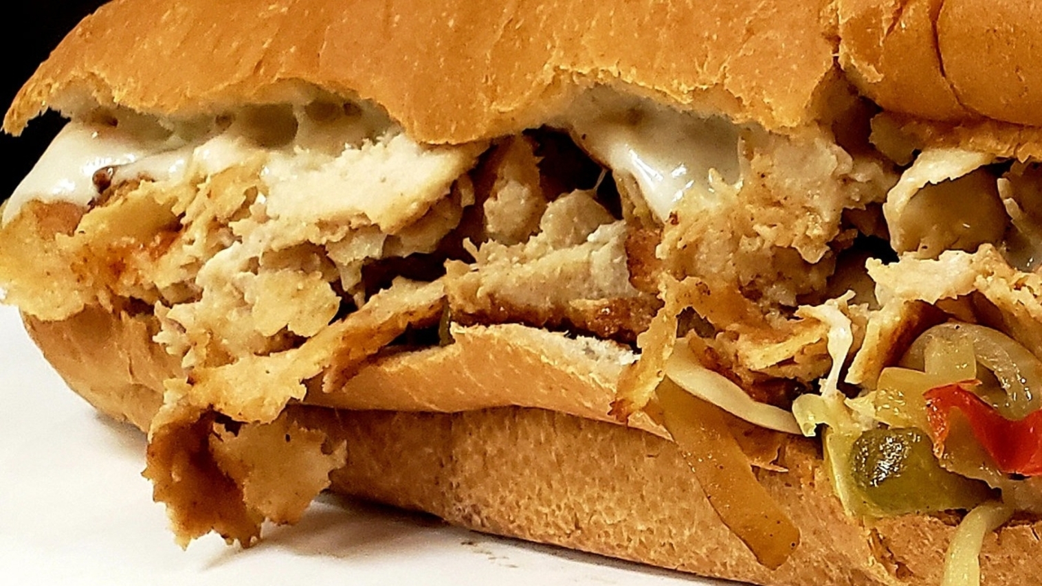 Order Chicken Steak & Cheese food online from Bozzelli's store, Springfield on bringmethat.com